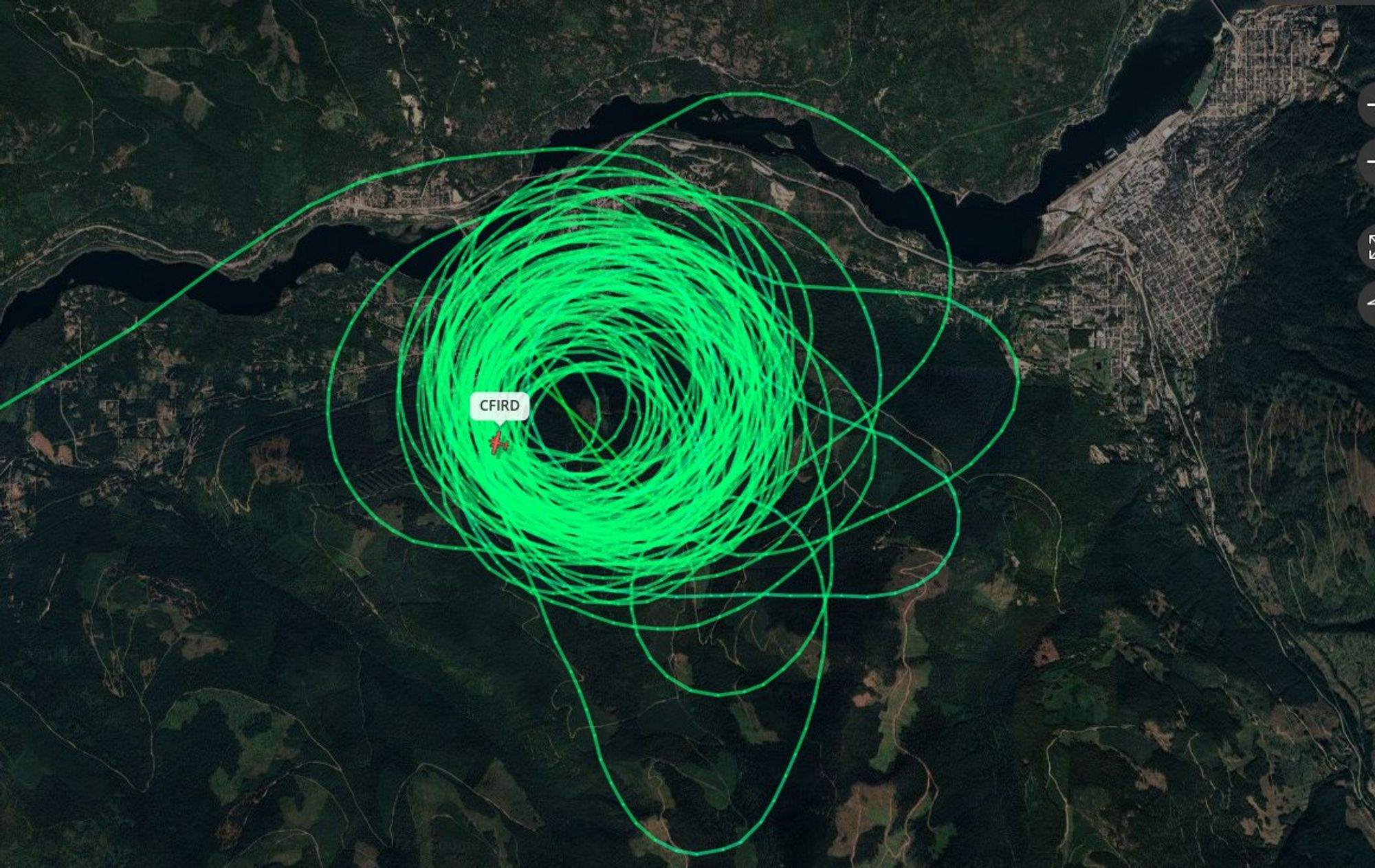 FlightRadar24 image showing spotter aircraft over BC wildfire near Nelson.