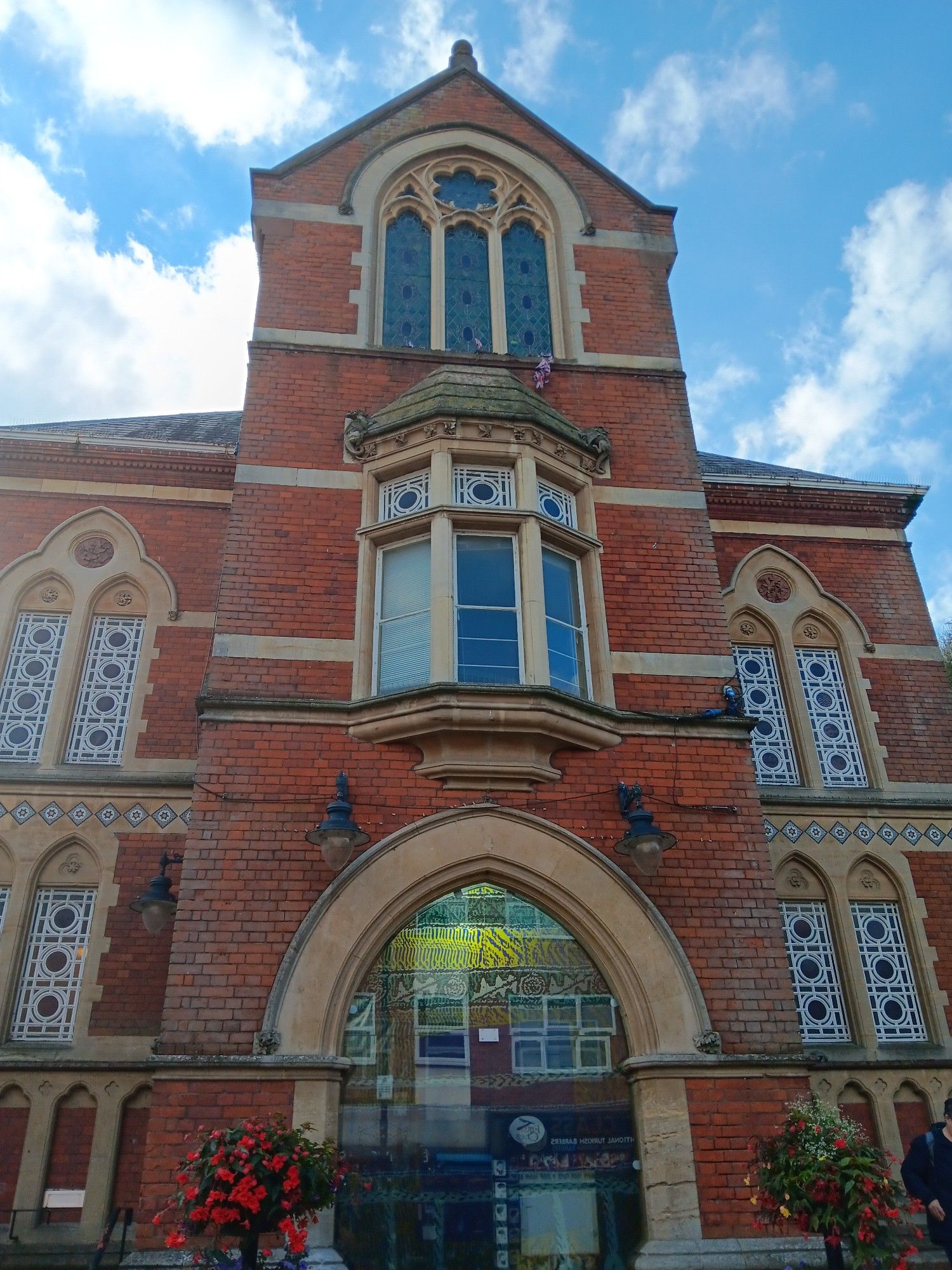 The main door of Haverhill Arts Centre, a Victorian red brick building