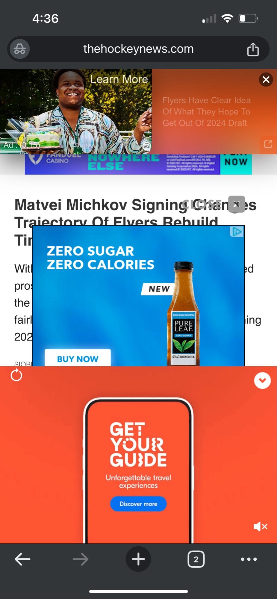 A mobile screenshot of thehockeynews.com. A story about Flyers prospect Matvei Michkov is almost totally obscured by takeover ads for related content, bottled tea, and travel. Great experience