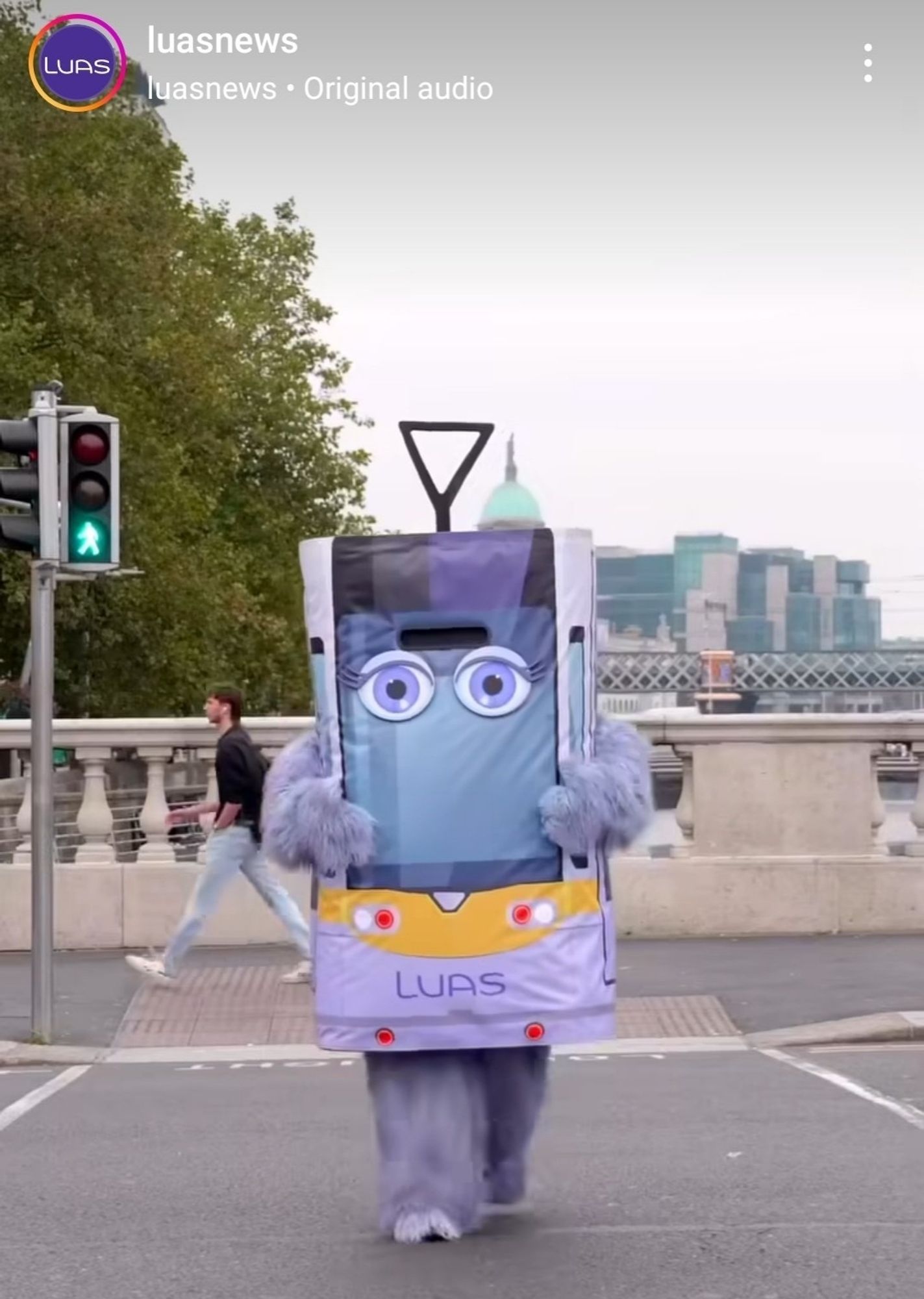 Someone in a costume that looks like the front of a luas with furry arms and legs.
An abomination, a mockery of God and nature alike