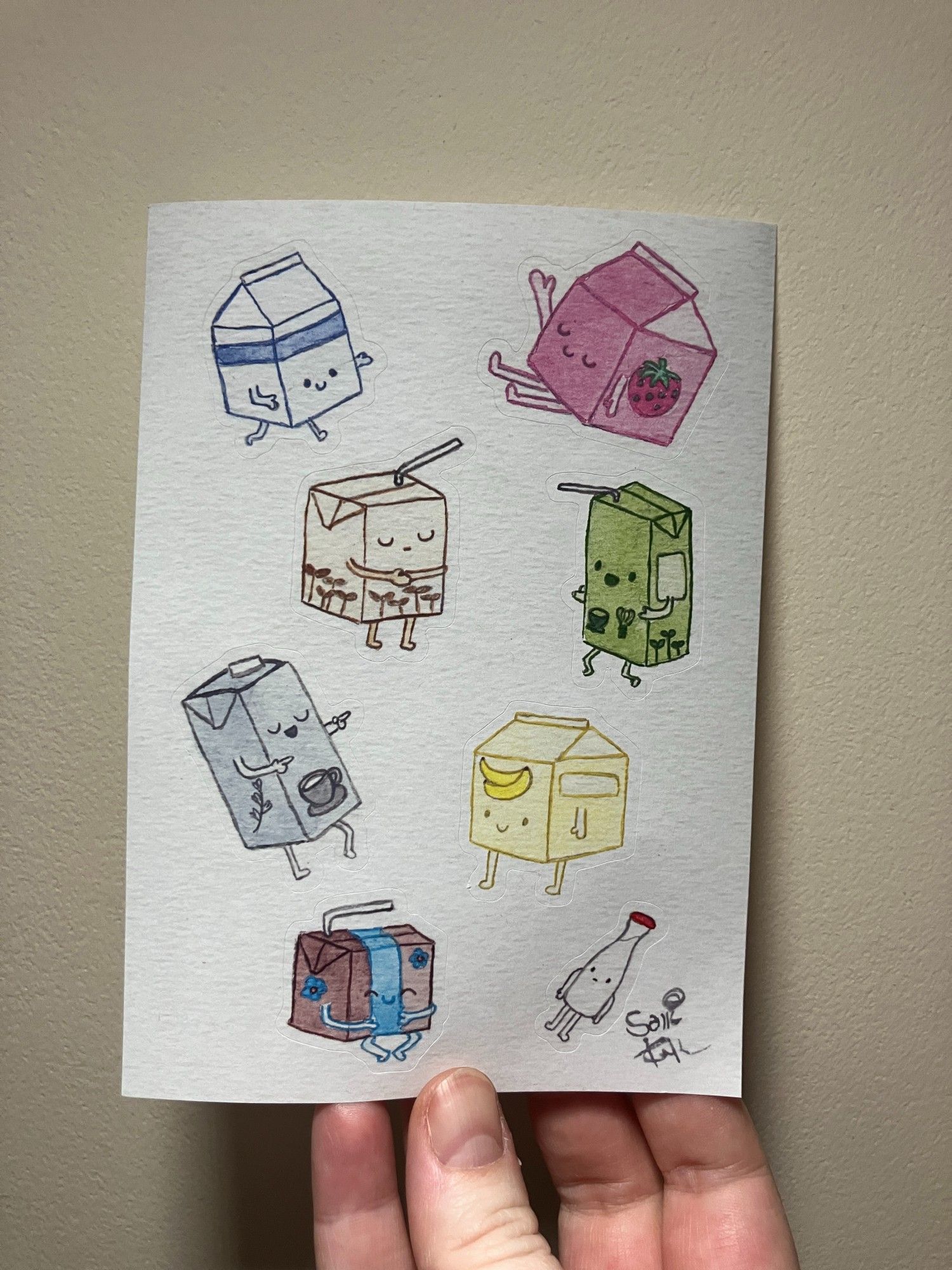 A sticker sheet of anthropomorphic milk cartons with various expressions