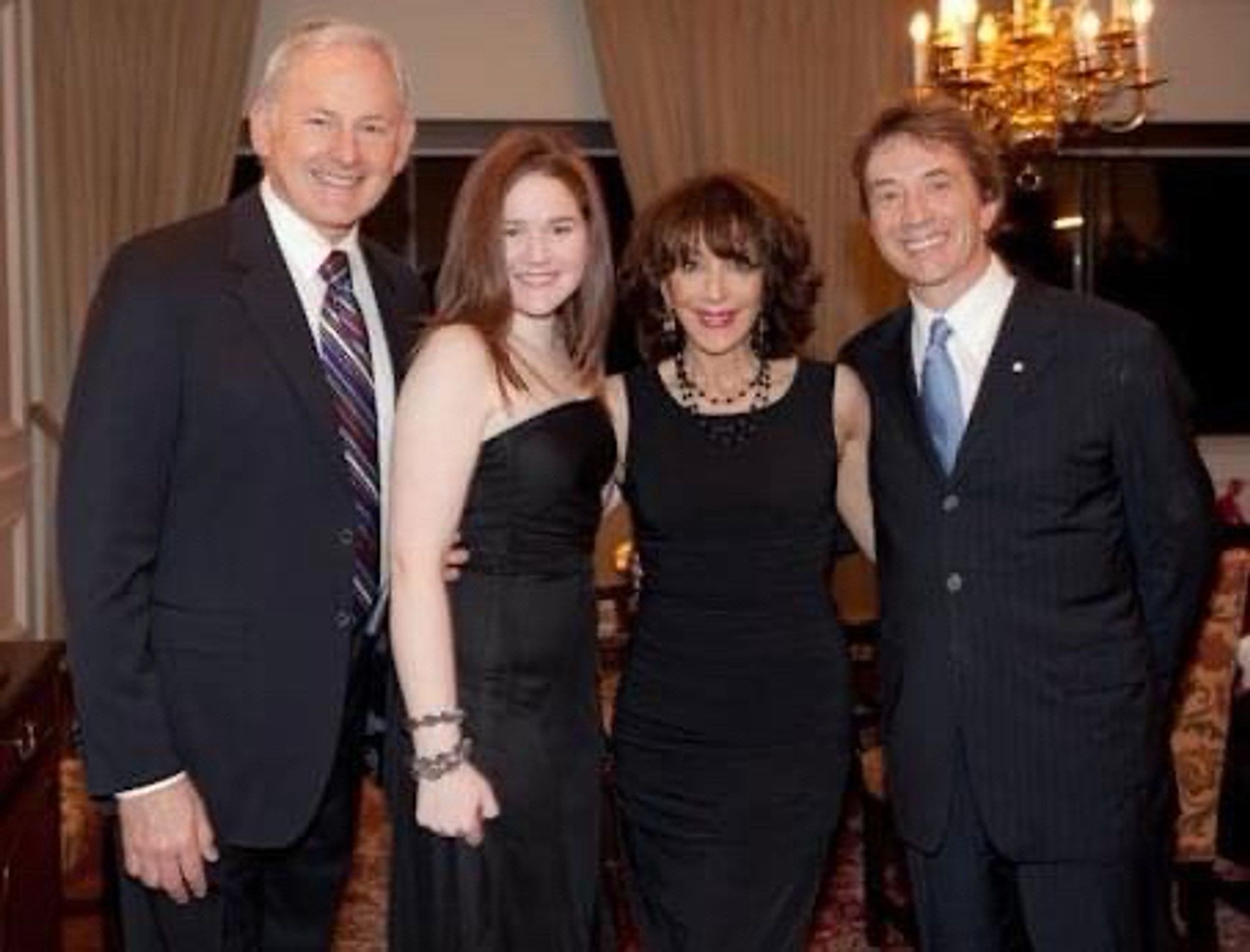 Photo of Kelly with Victor Garber. Andrea Martin and Martin short at a black tie fundraising event.