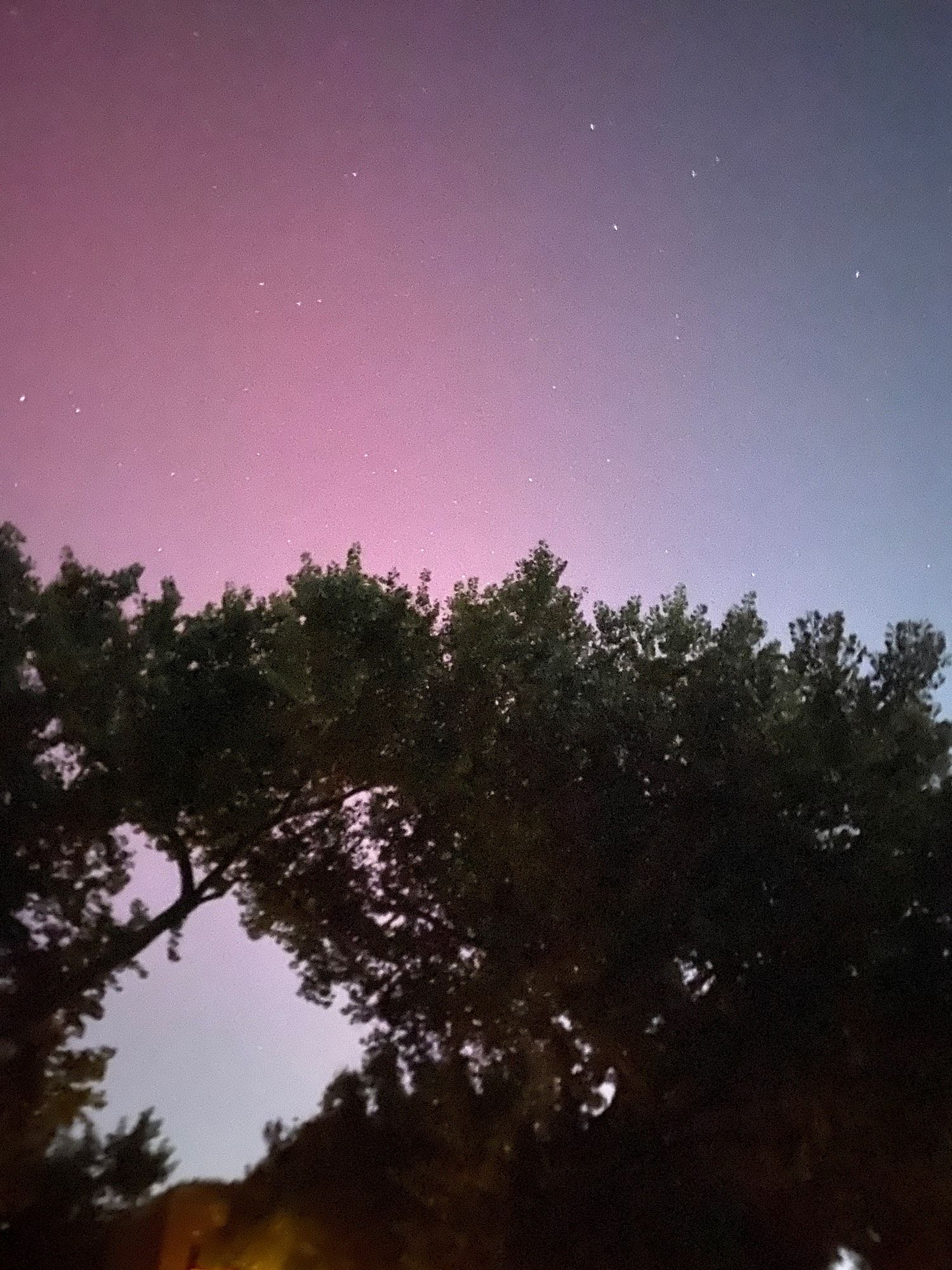 Nighttime sky with hues of purple, pink and blue