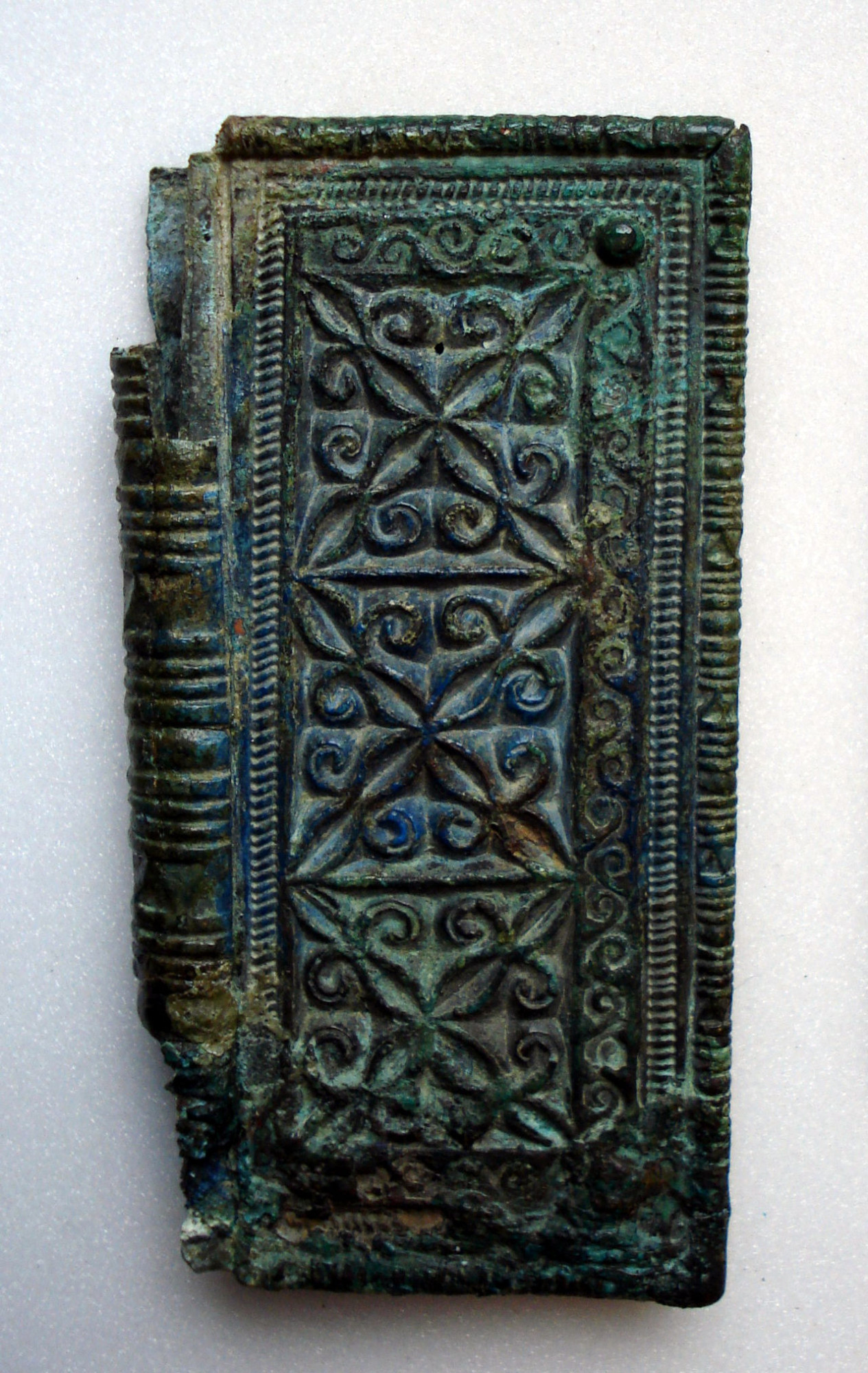 Copper-alloy chip-carved buckle plate from Kent (GBR). Image: © The Trustees of the British Museum (CC BY-NC-SA 4.0)