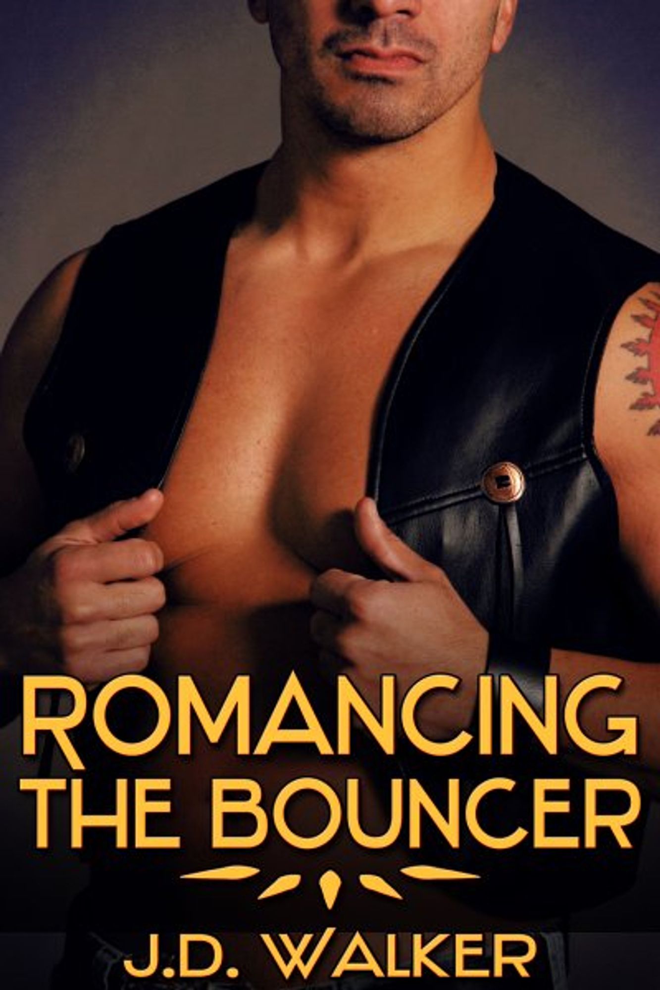 Romancing the Bouncer by J.D. Walker
In the image is a man, likely in his late twenties or early thirties, wearing a black leather vest with no shirt underneath. He has a muscular chest and arms, and his hands are holding the flaps of the leather vest against his chest. Only the lower part of his face is visible, which is unshaved. His skin is a very light brown color, and the image of a red sun is barely visible at the edge of the image, on his left shoulder.