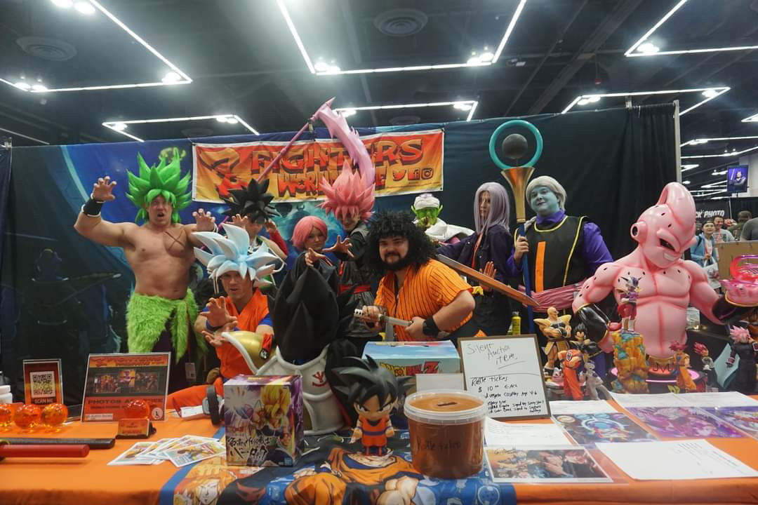 Michea cosplaying as Kusu from Dragon Ball Super along with other members of the Z Fighters Worldwide Charity group.