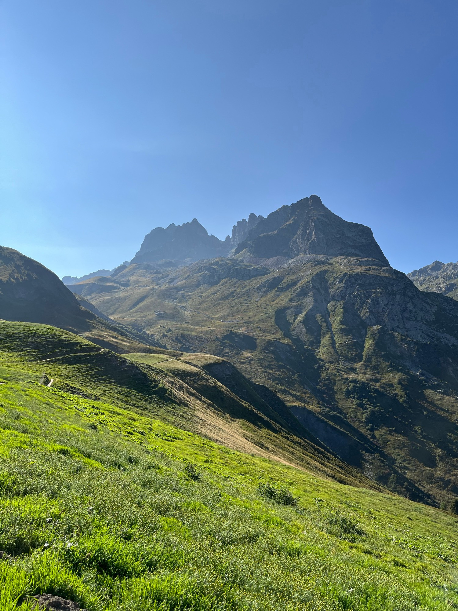 Photography of a mountain in the French Alps. The sky is blue without any clouds.