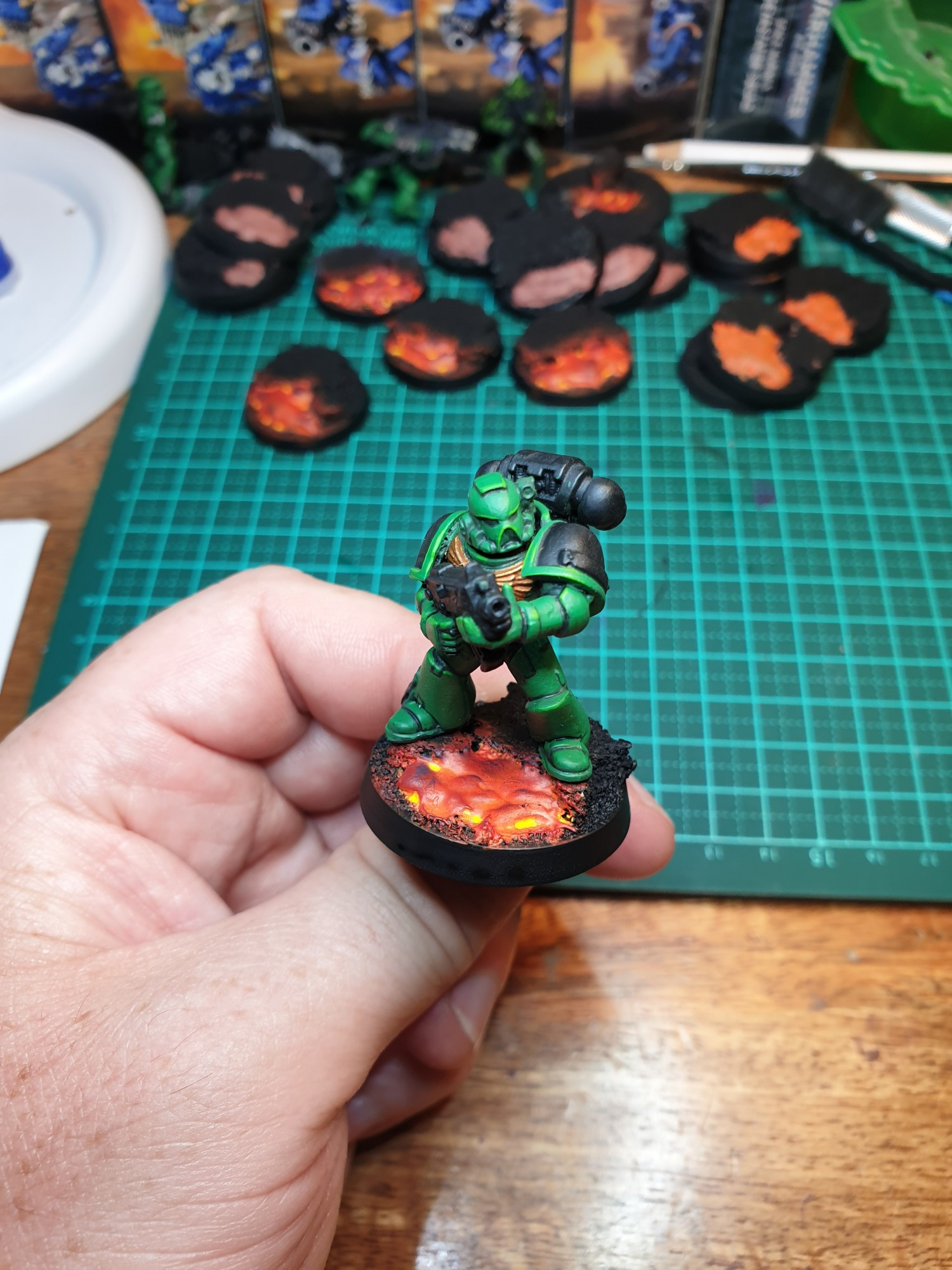 Space Marine Tactical Marine for Warhammer 40k. Painted with green, gold and lava OSL effects