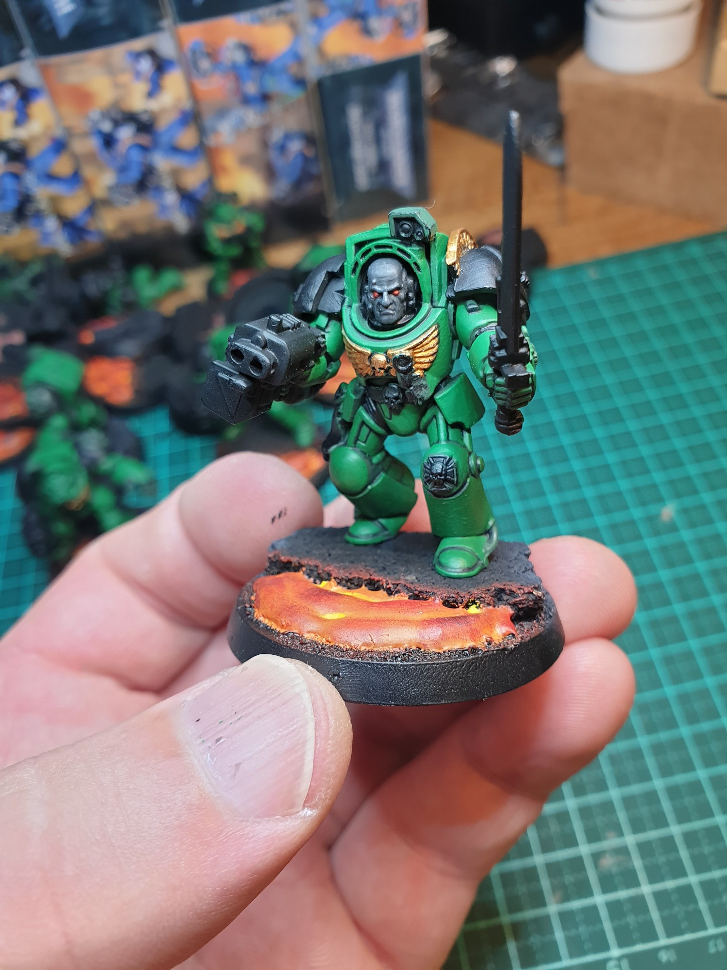 Space Marine Terminator Sergeant for Warhammer 40k. Painted with green, gold and lava OSL effects