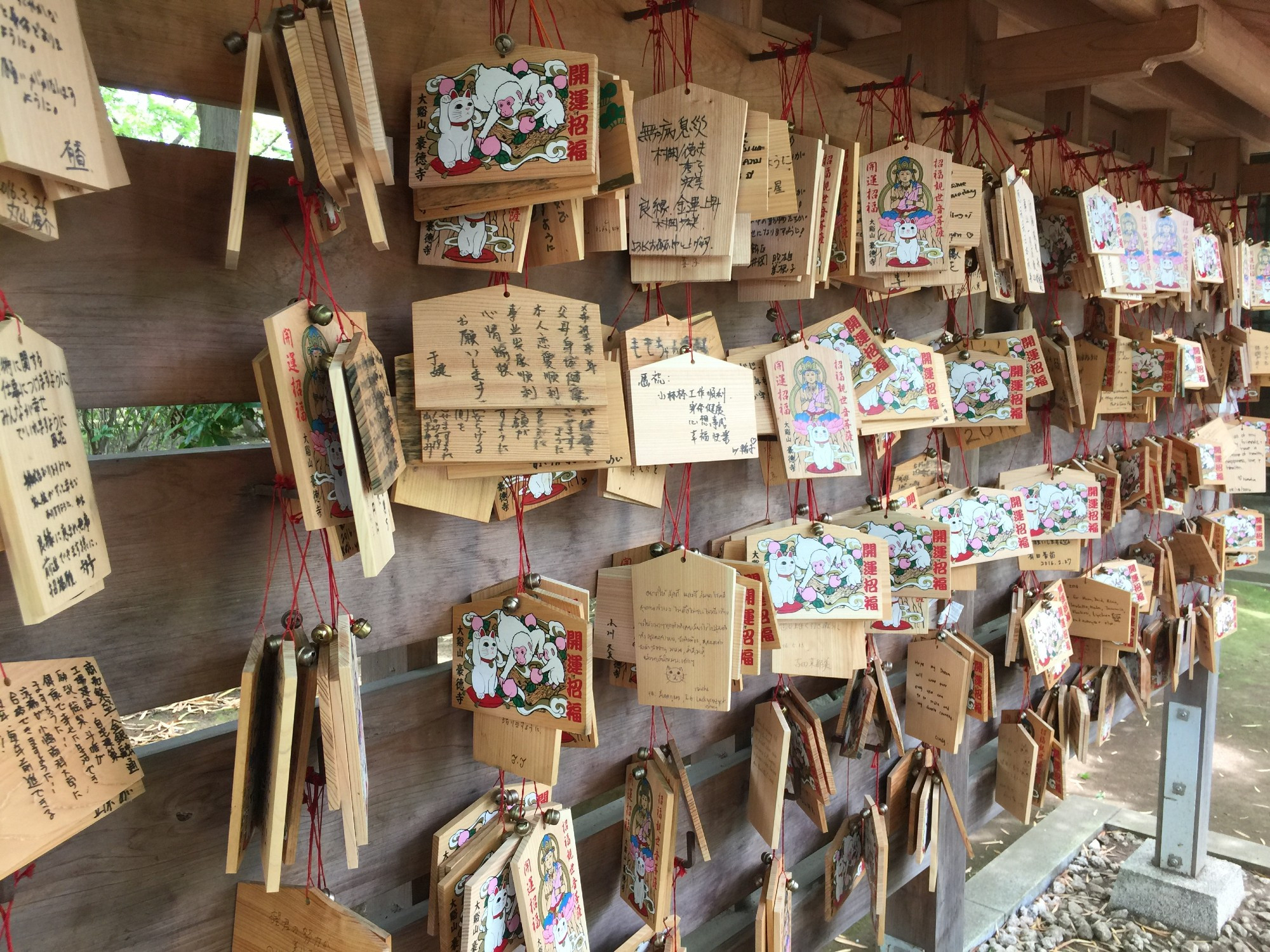 Gohtokuji temple in Tokyo Japan, votive pictures on the wall