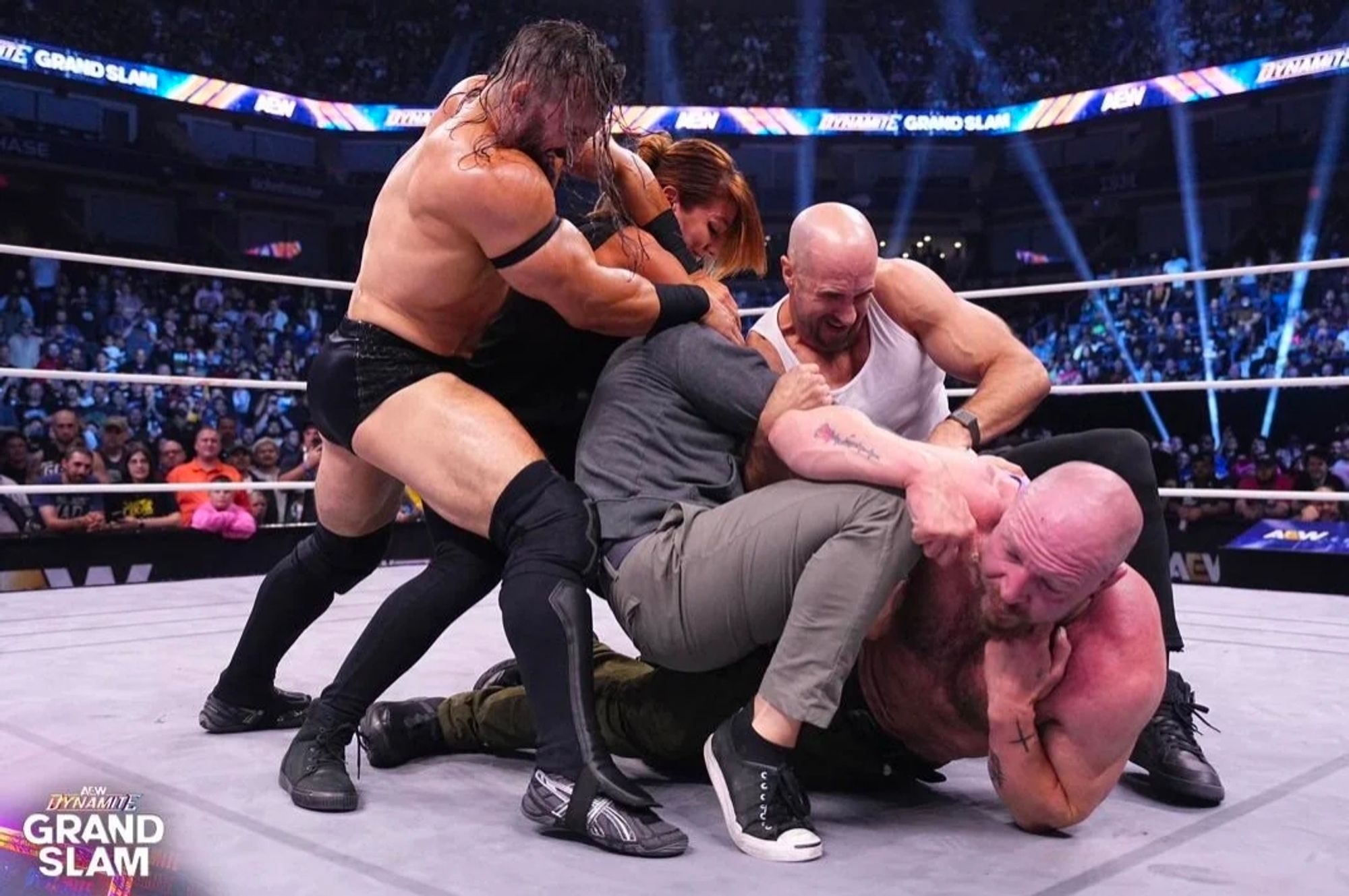 several people in the ring, including John Moxley, Pac, and Brian Danielson, from AEW strangling each other in a formation akin to a Renaissance painting. This was taken from the accidental Renaissance Reddit page.