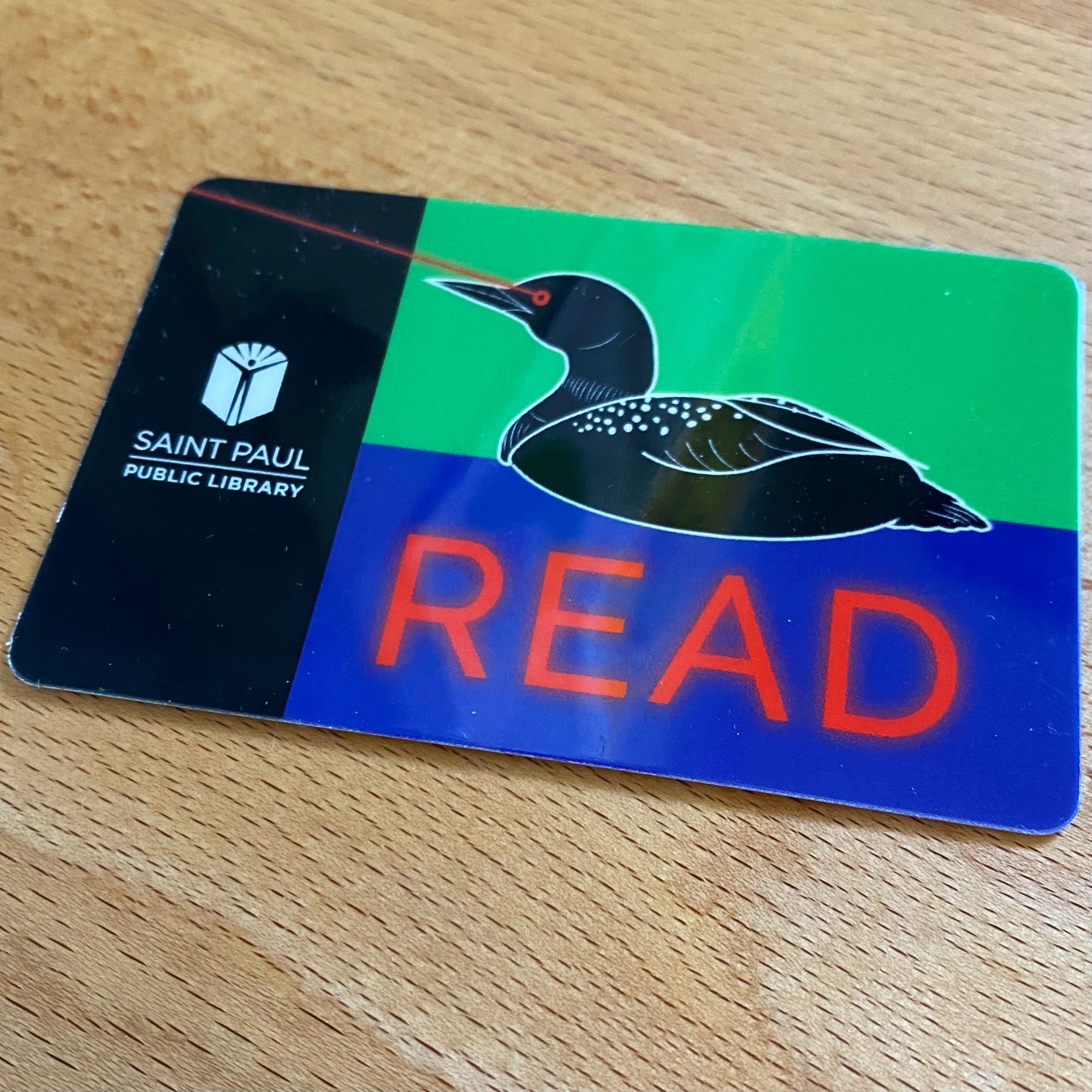 A picture of a laser loon library card from St. Paul.