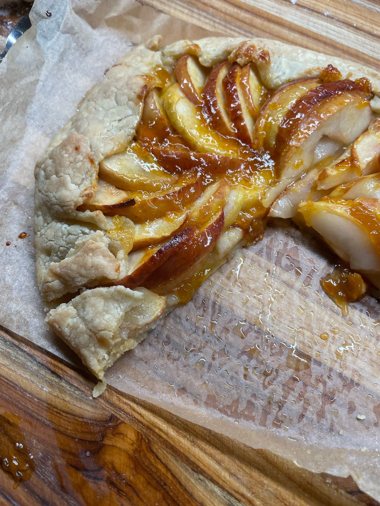 it’s a pear and apple tart with apricot jam on top