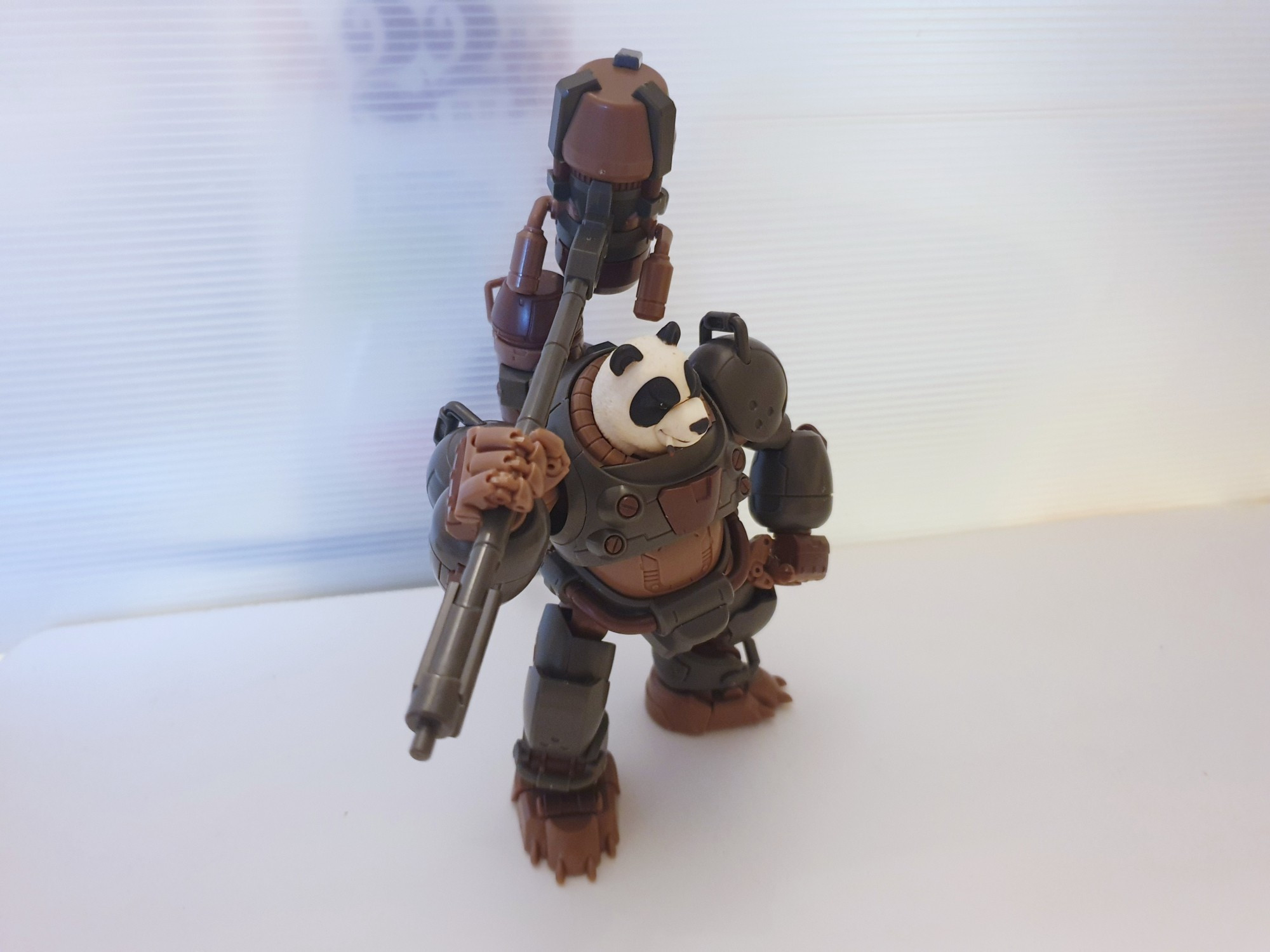 Right side view of Number 57 Manhunter Shenshu panda armor with hammer