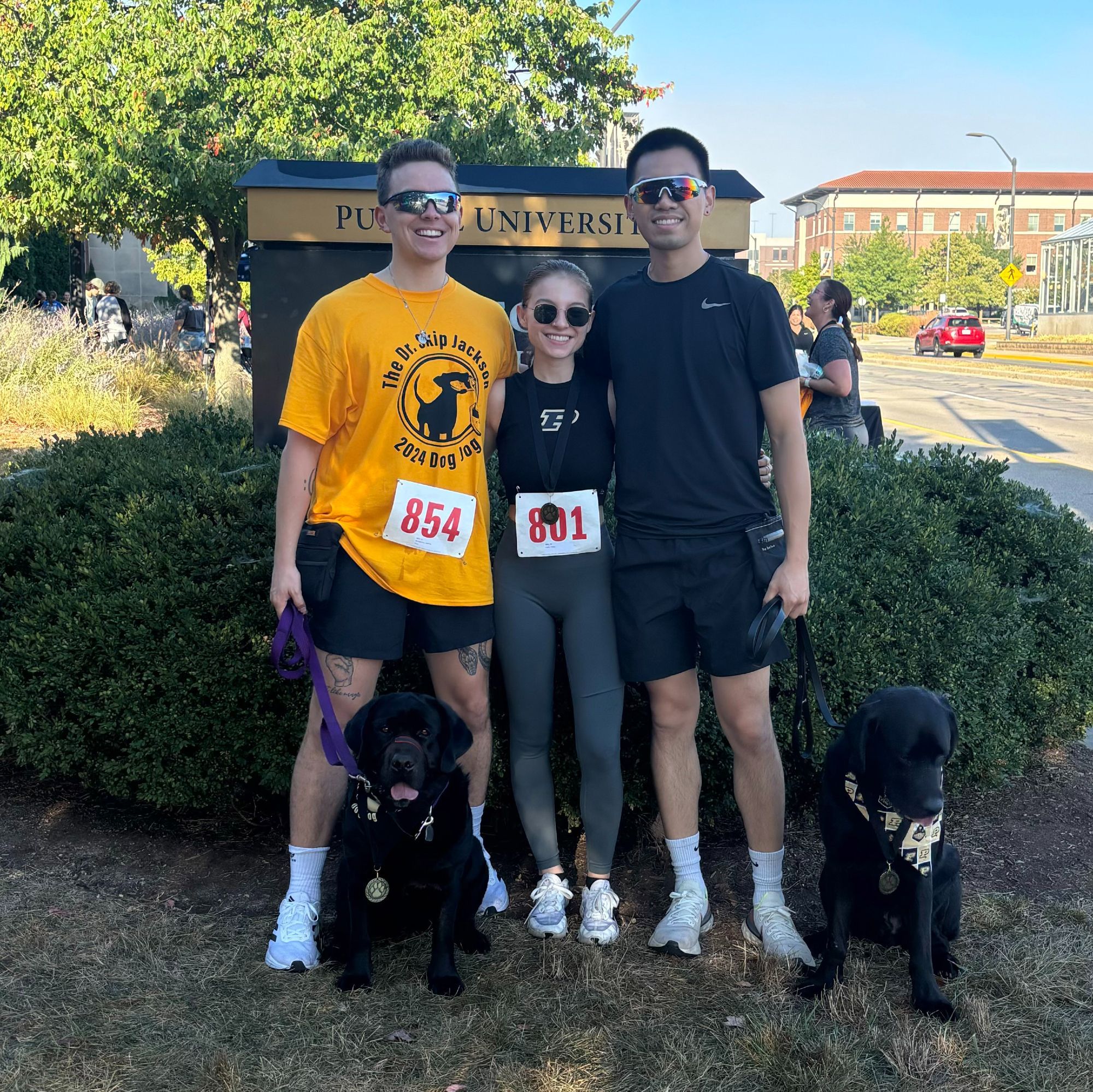 Andrew Montgomery, their friend, Jordan Chan and dogs Briggs and Trixie