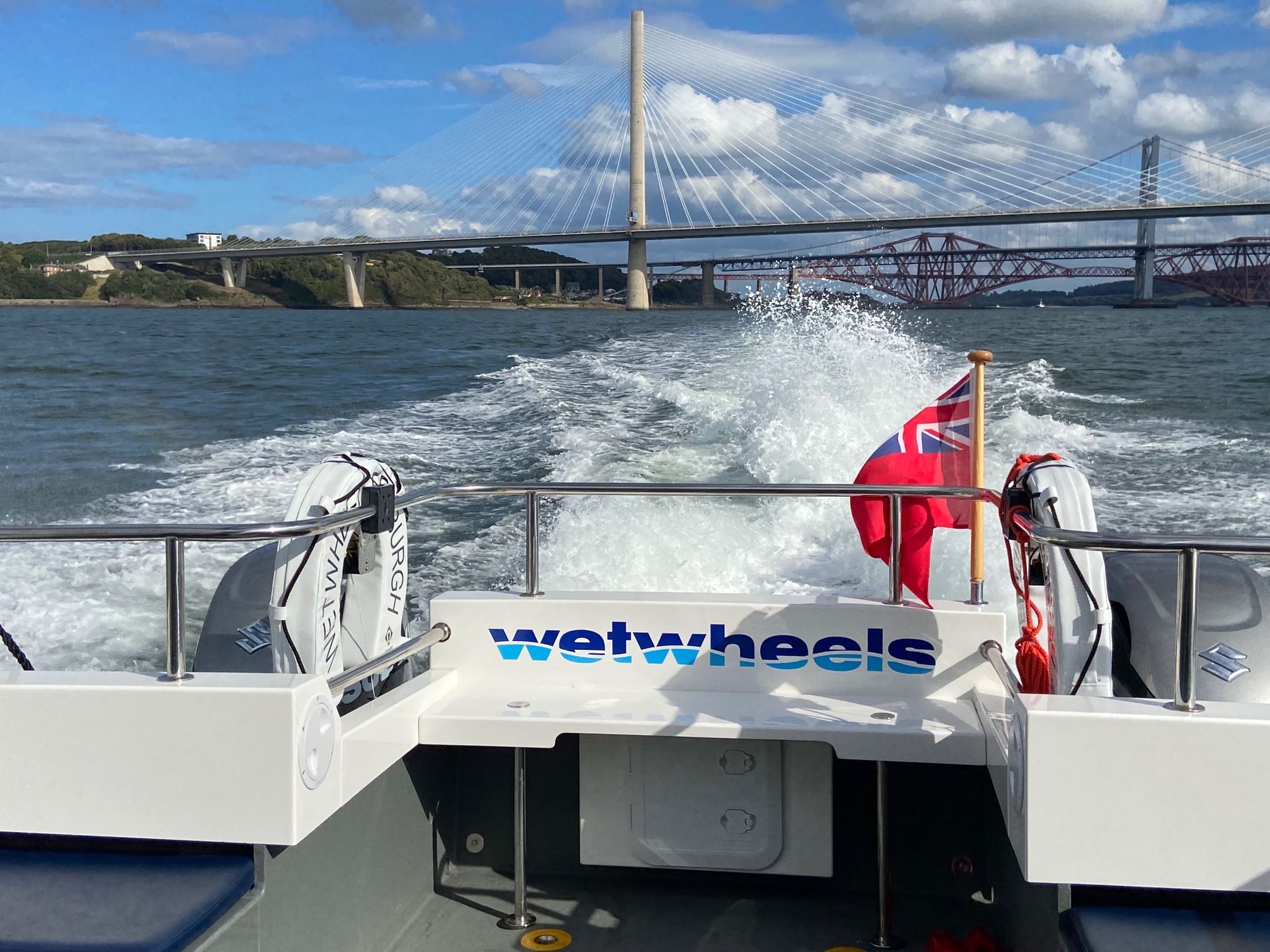 WetWheels boat on the water with Forth Bridges behind