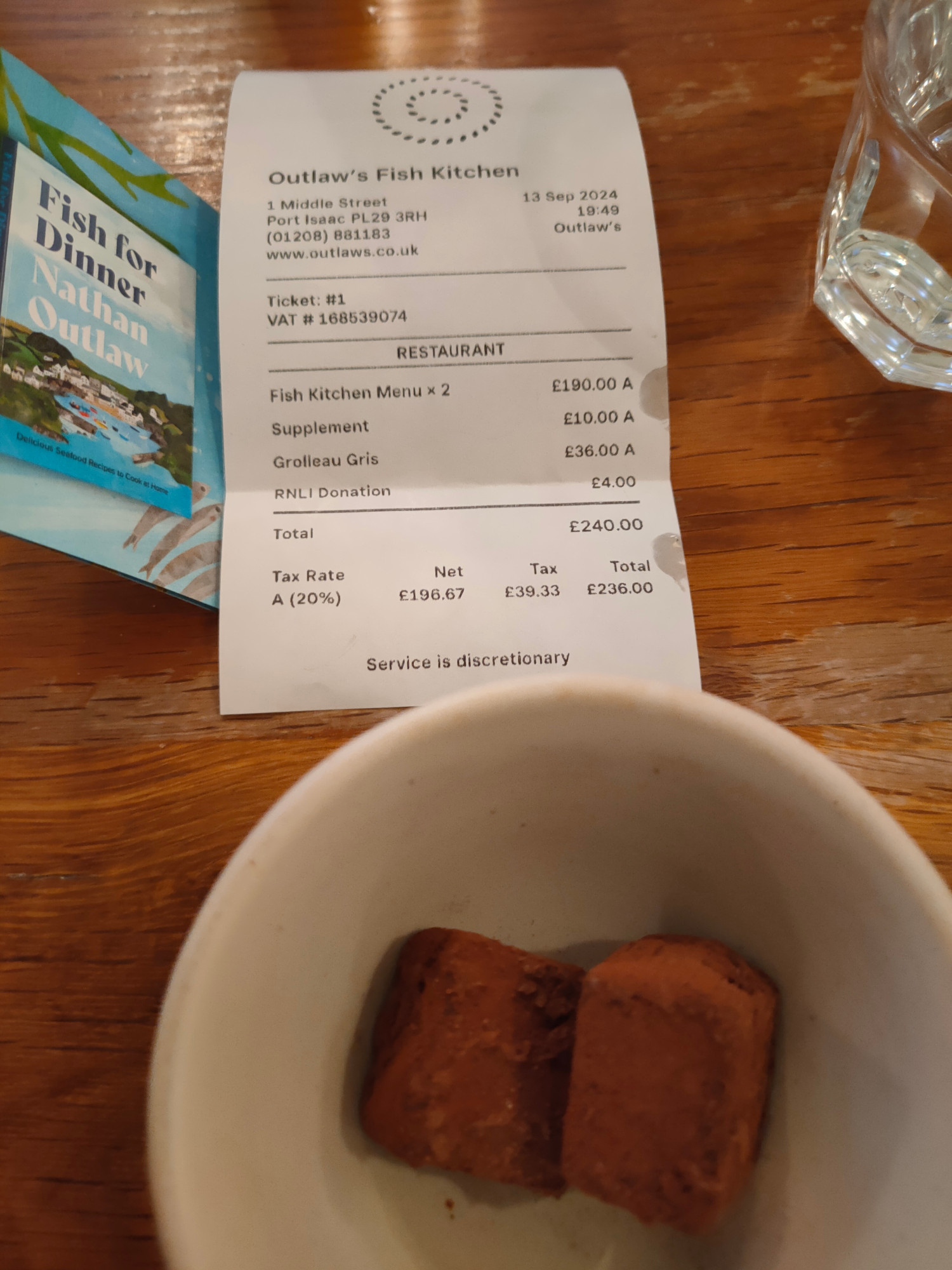 Couple of dark chocolate and brandy truffles came with the bill.