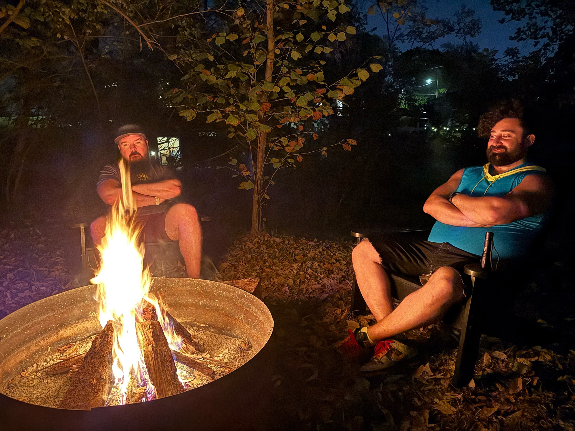 Friends by a bonfire. 