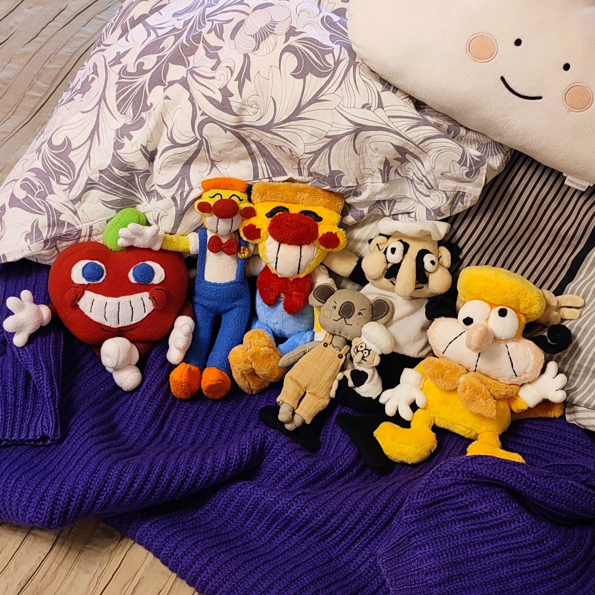 Pizzatober Day 11: Plushie time!

This one is a freebie. So, enjoy a photo of all the PT plushies I've made: Genatsvale (big Fake Peppino), Pelmino (small Fake Peppino with magnets!), Pizzahead and Pizzahead (with a Pizzaface badge, yeeeee), Noise, Pepperman. And Belyashik the koala bear - he's very important to the PT cast.
