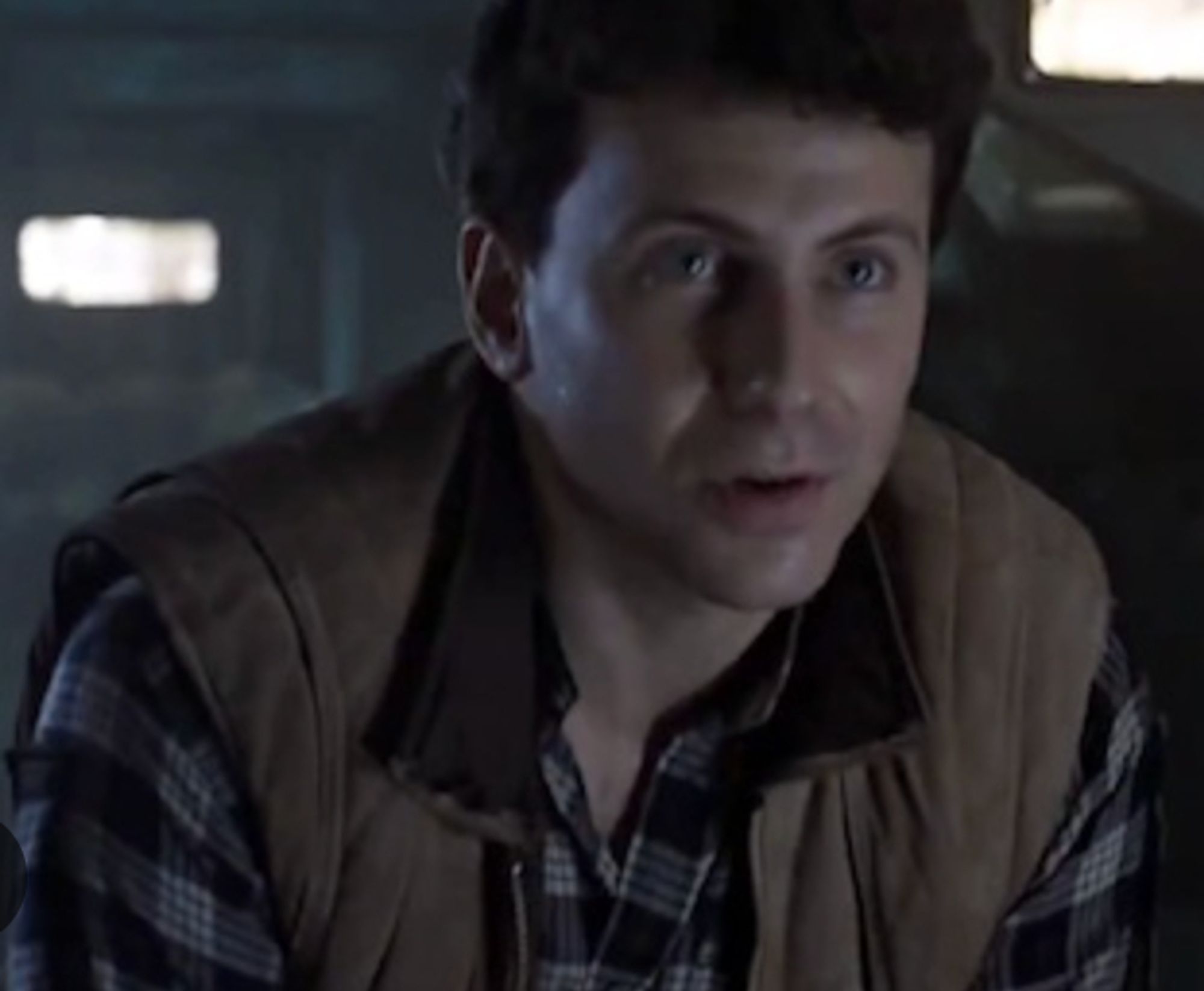 Carter Burke in Aliens, wearing a shirt and a gilet.