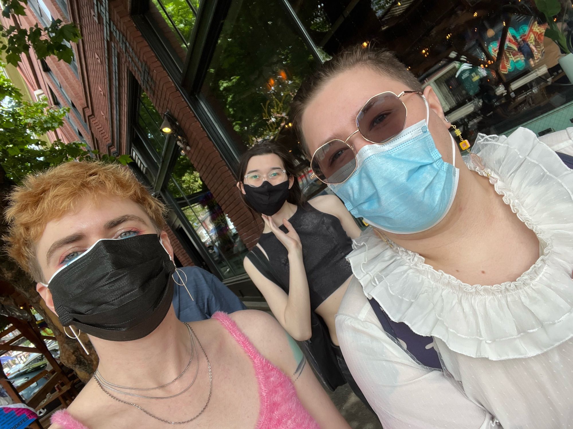 group selfie of me with some friends, masked up walking around Seattle Pride