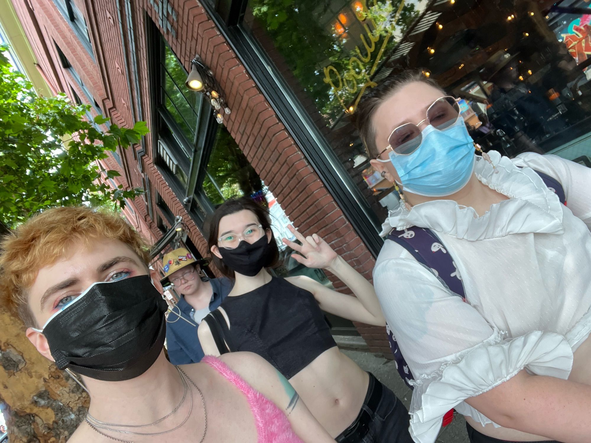 group selfie of me with some friends, masked up walking around Seattle Pride