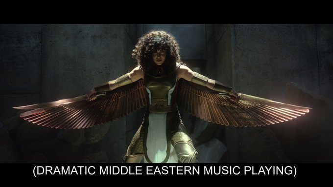 Palestinian Egyptian actress Mays Calamawy as the Scarlet Scarab, with the caption "dramatic middle eastern music playing."