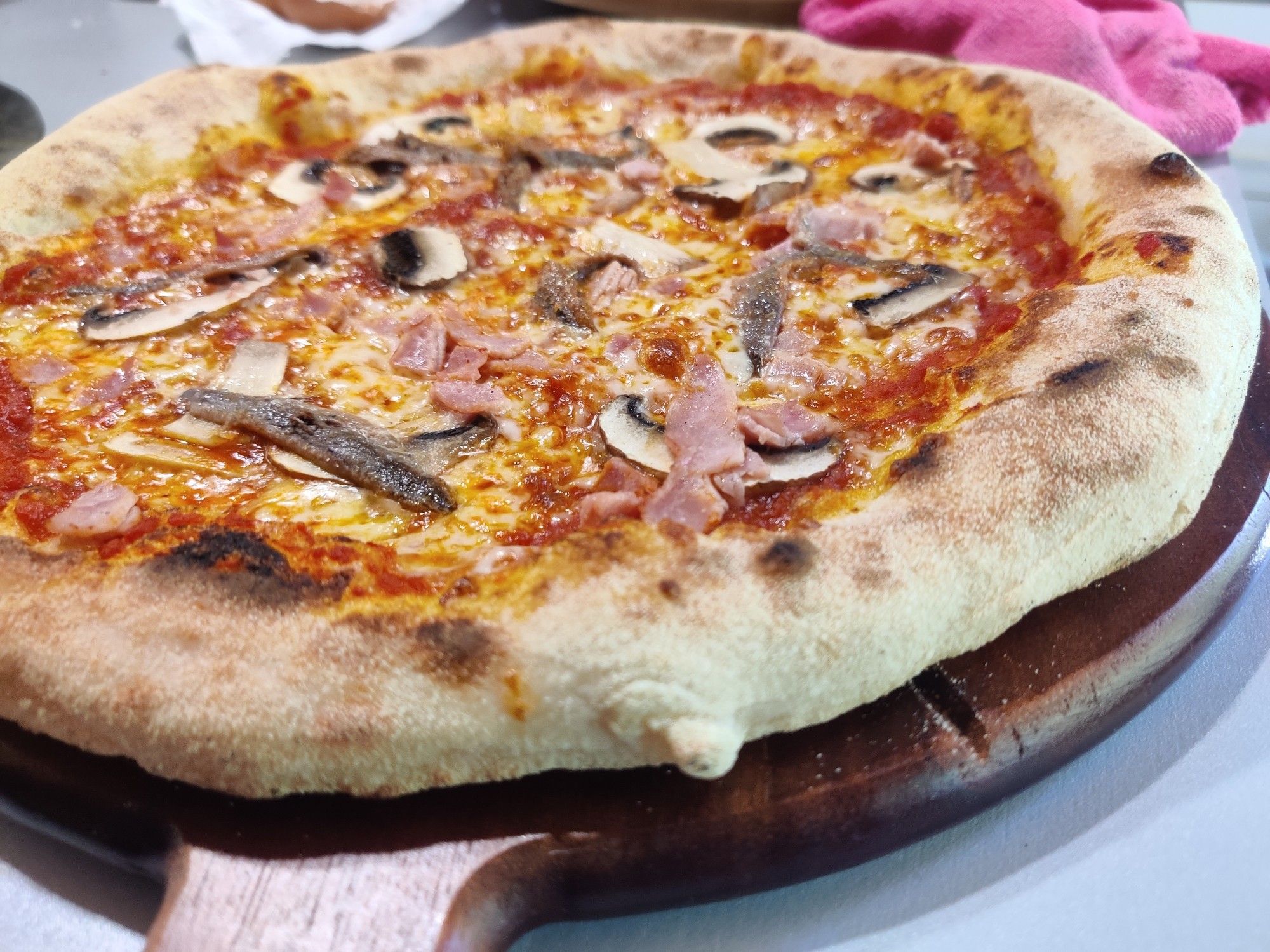 Neapolitan style pizza, three quarter view