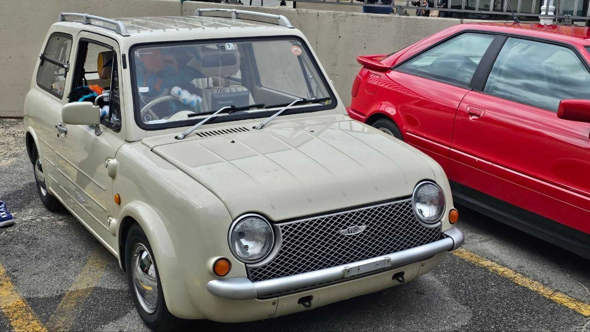 Casper fursuiting inside the Nissan Pao