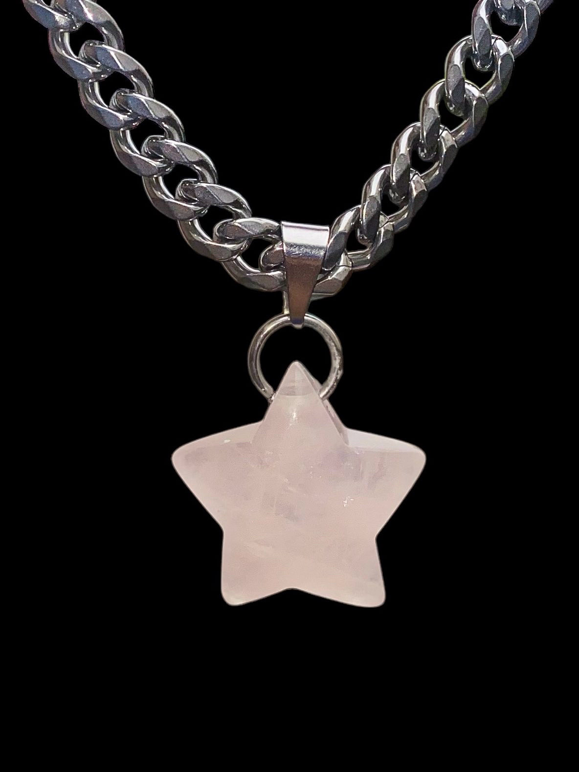 Carved Rose Quartz Crystal Pendant in the shape of a Star on a Stainless Steel Cuban Link.