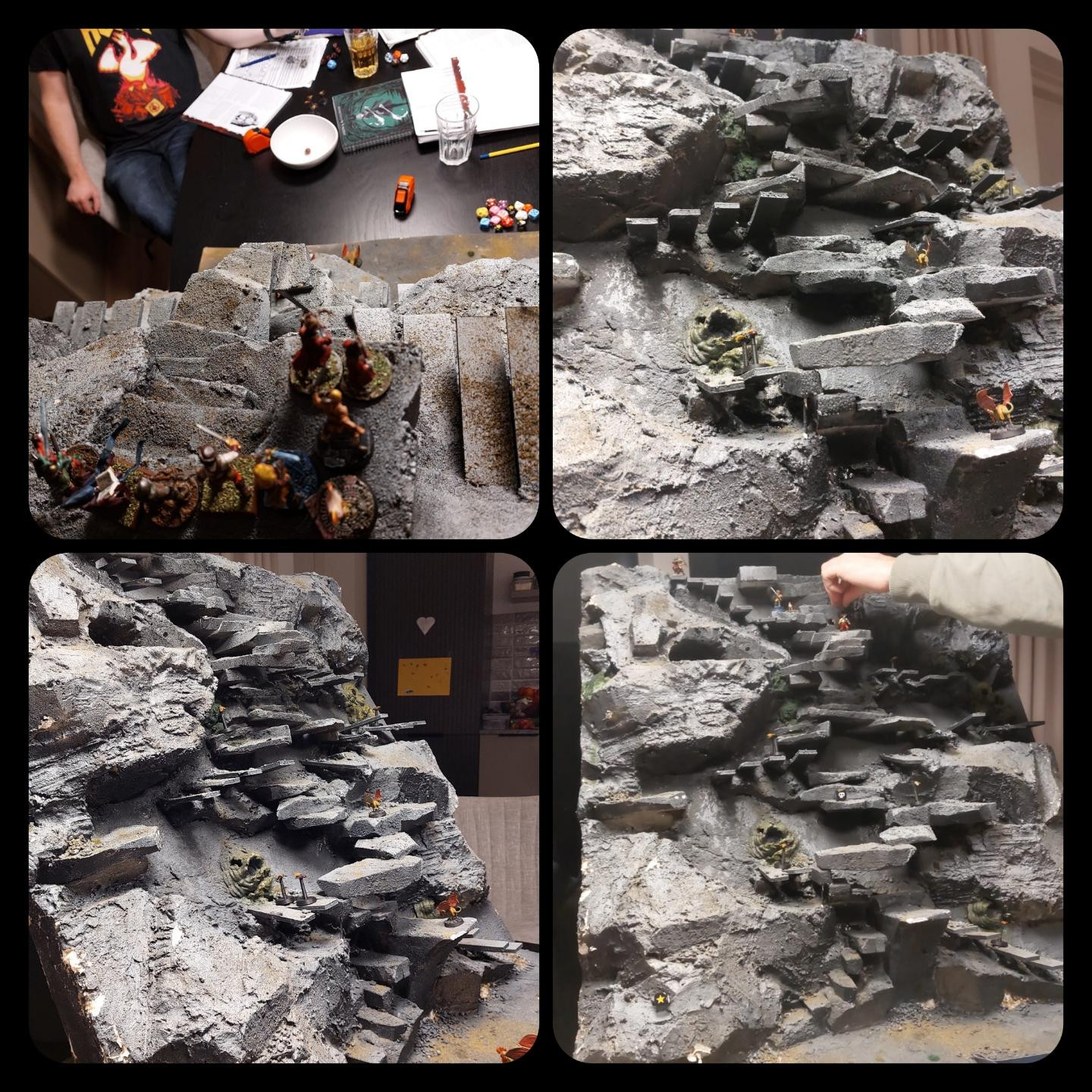 Four pictures of a giant terrain piece that is basically slanted rock face with many stair steps sticking out of it and a few gnarly organic looking things that are fly holes. 

The thing barely fits on the table. Models are barely visible is how ridiculously large it is. In one picture you can see one of the players Arms reaching over it and while he's average height, his arm is not really impressive on the pic