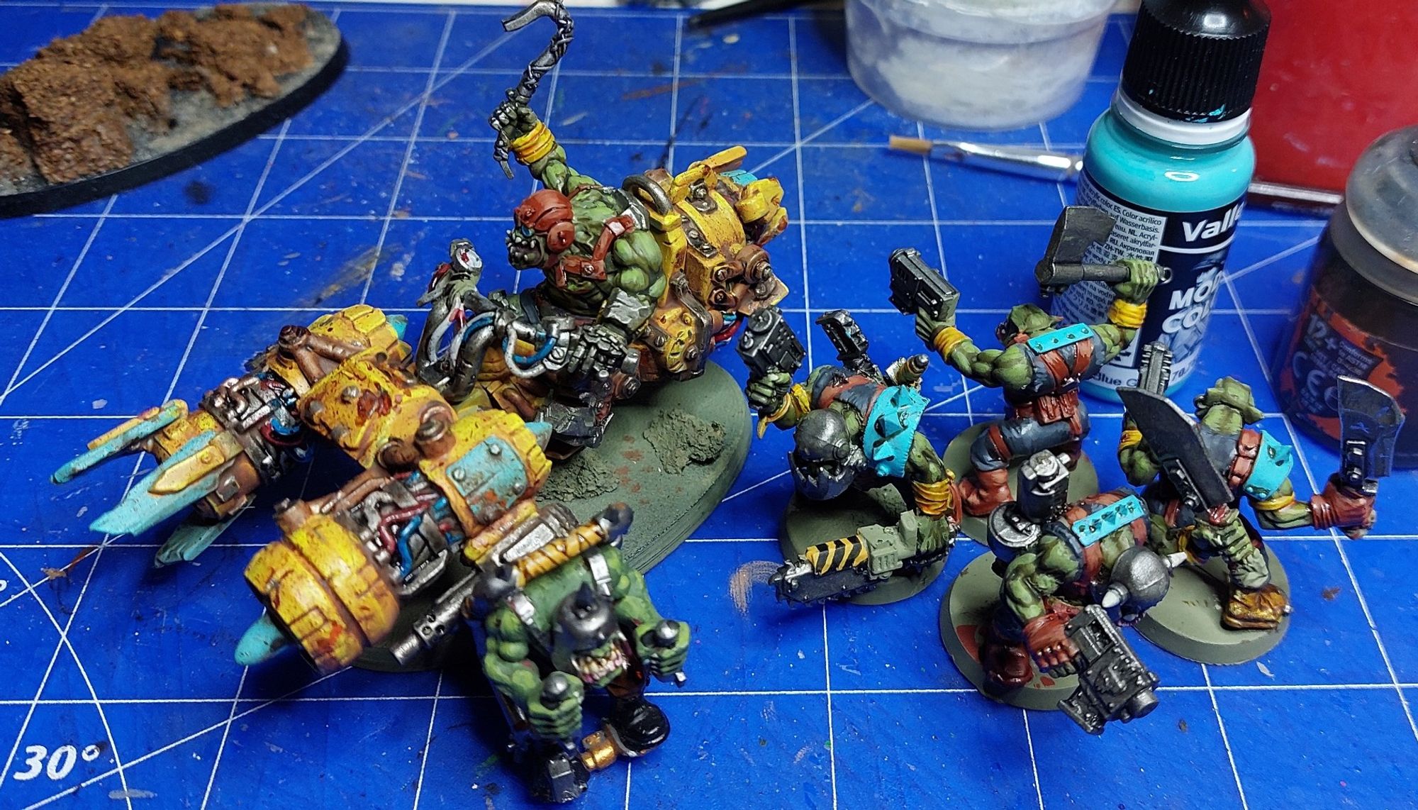 6 orc boys of which one is riding a jet bike. All decently painted