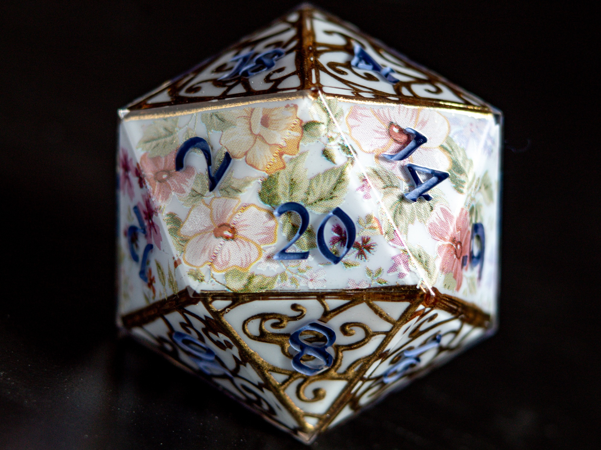 Handmade regency era 32mm D20 with handpainted gold filigree. 