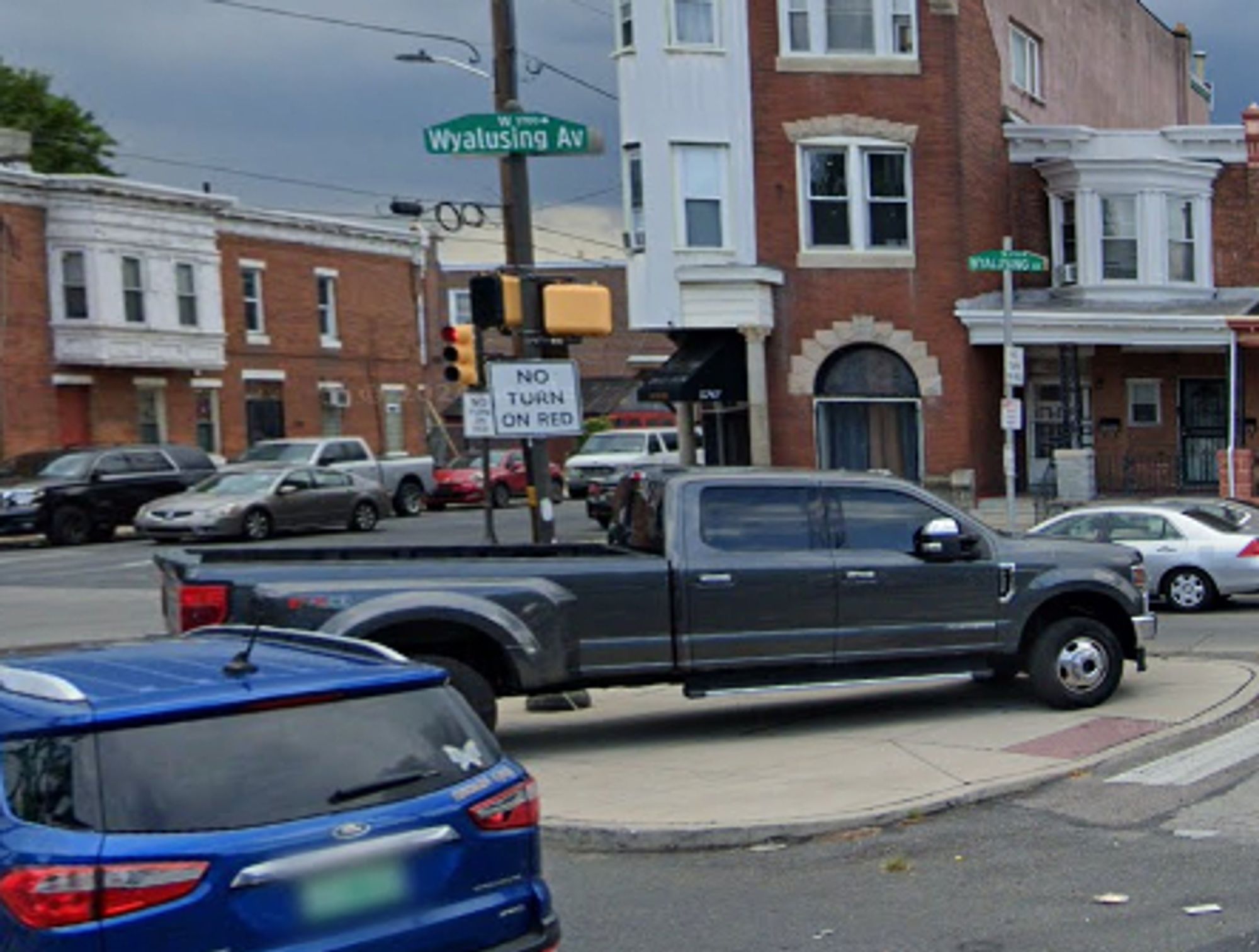 a different view of the same truck parked illegally on a pedestrian island at the intersection of Wyalusing Avenue and 58th St in West Philadelphia