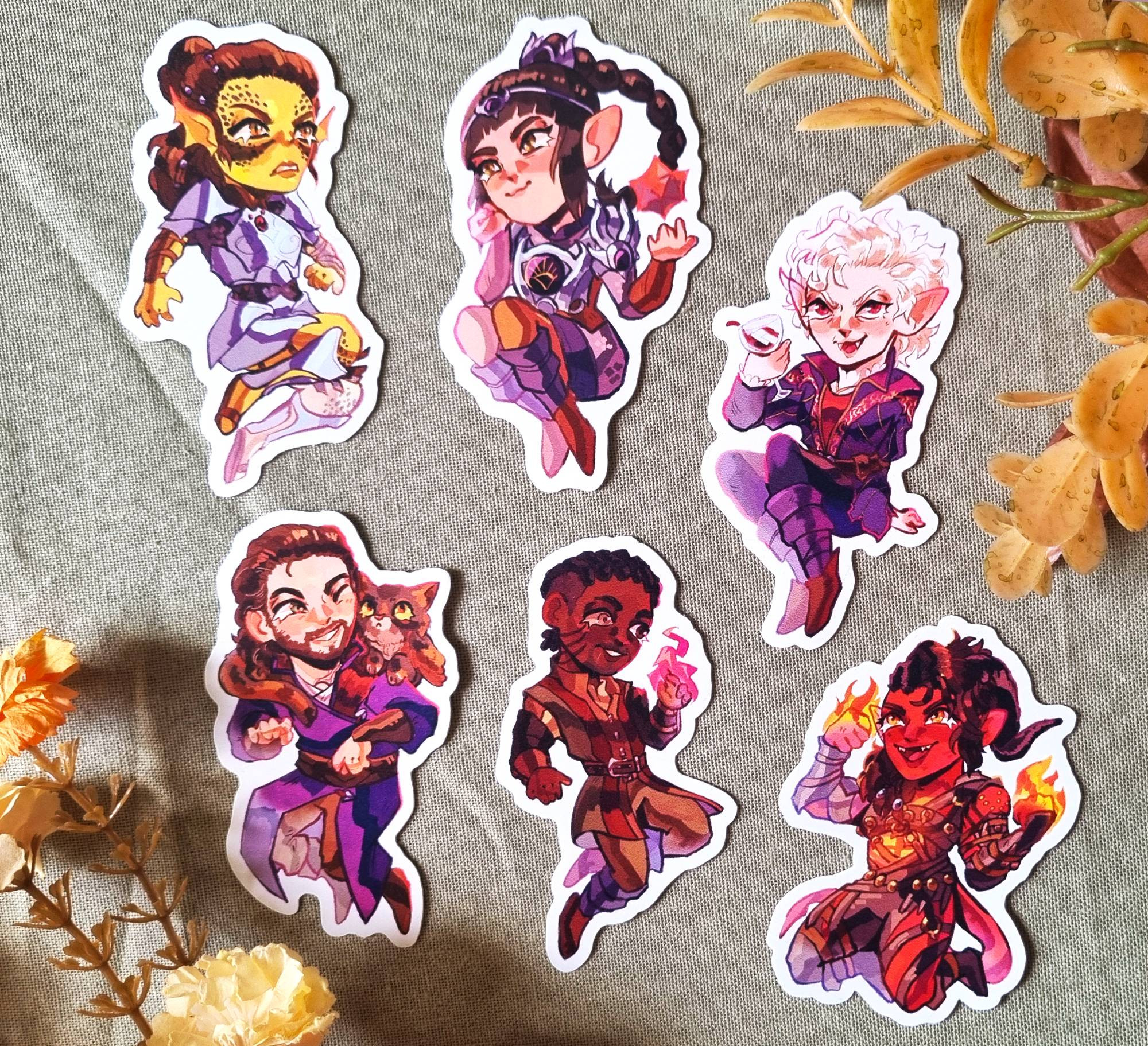 A set of 6 stickers of the main cast of companions from Baldur's Gate 3 - Lae'zel, Shadowheart, Astarion, Wyll, Gale and Karlach, illustrated in a cute chibi style.