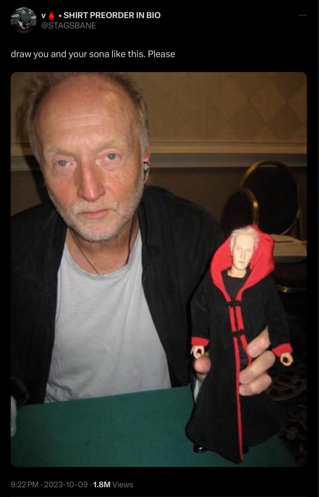 Reference image: Tweet captioned “draw you and your sona like this. Please”, with a picture of Jigsaw actor Tobin Bell holding a Jigsaw figurine