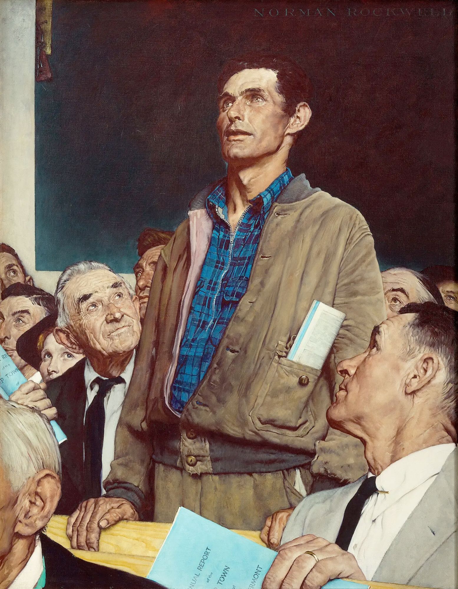 Crop of Norman Rockwell's "Freedom of Speech" painting, which has been used as a meme template. The painting shows a man standing at a public meeting, delivering a speech. He is the center of attention, with the surrounding sitting crowd looking up at him. Rockwell depicts the man in a simple brown jacket and blue denim shirt, highlighting his working-class background. Meanwhile, while some attendees only have their faces showing, those closer to the standing man are wearing suit and tie, highlighting a class difference.