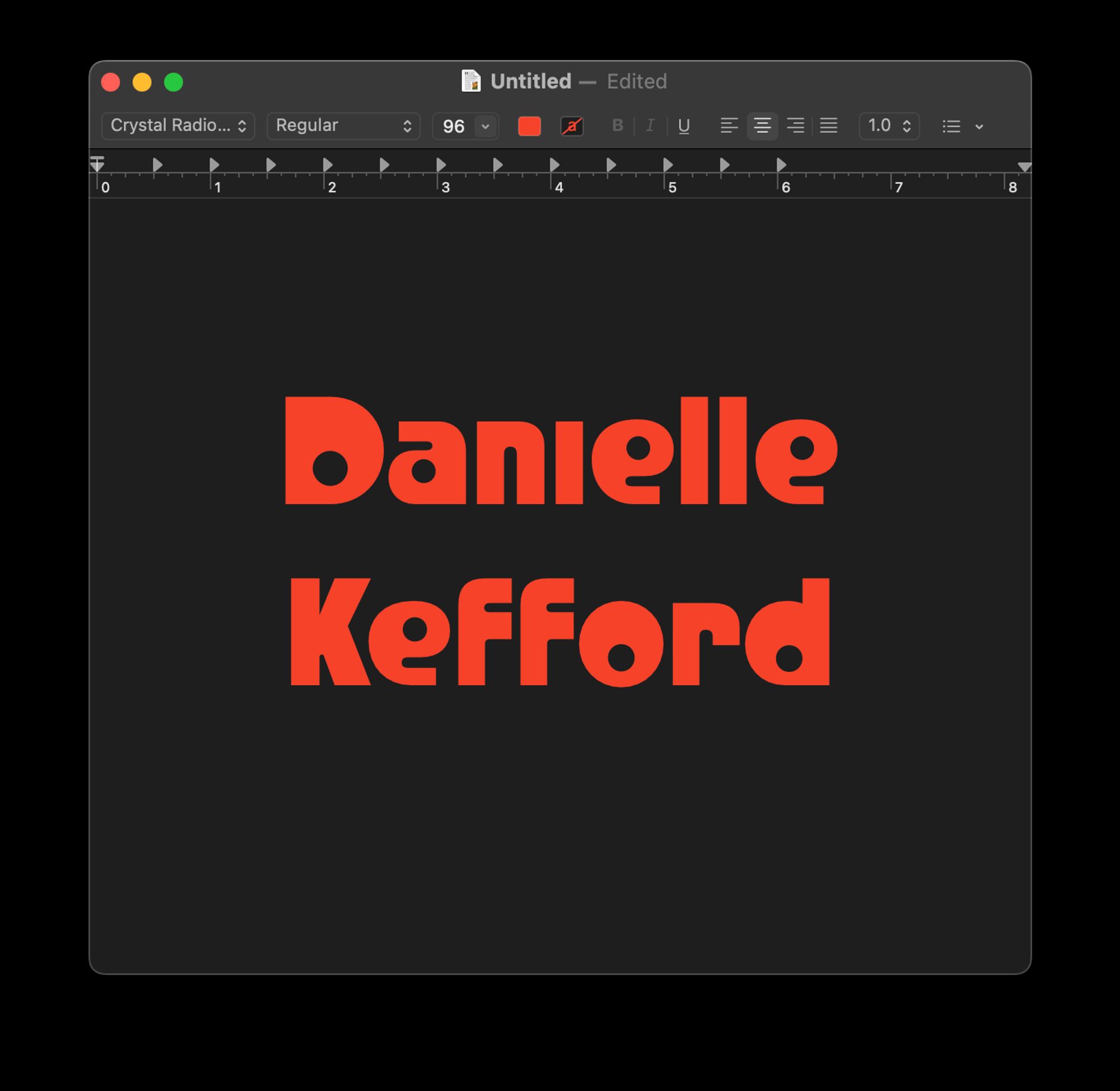 Screencap of TextEdit window showing my name in red 96pt and using the font I described