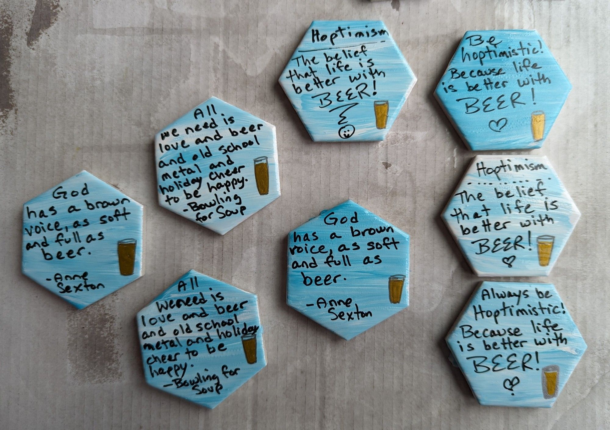 Beer themed kindness rocks.