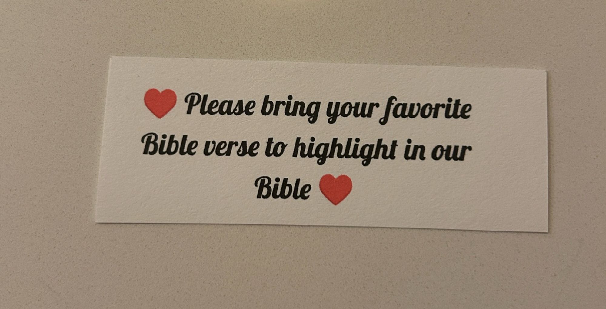 A note that says, “please bring your favorite Bible verse to highlight in our Bible”