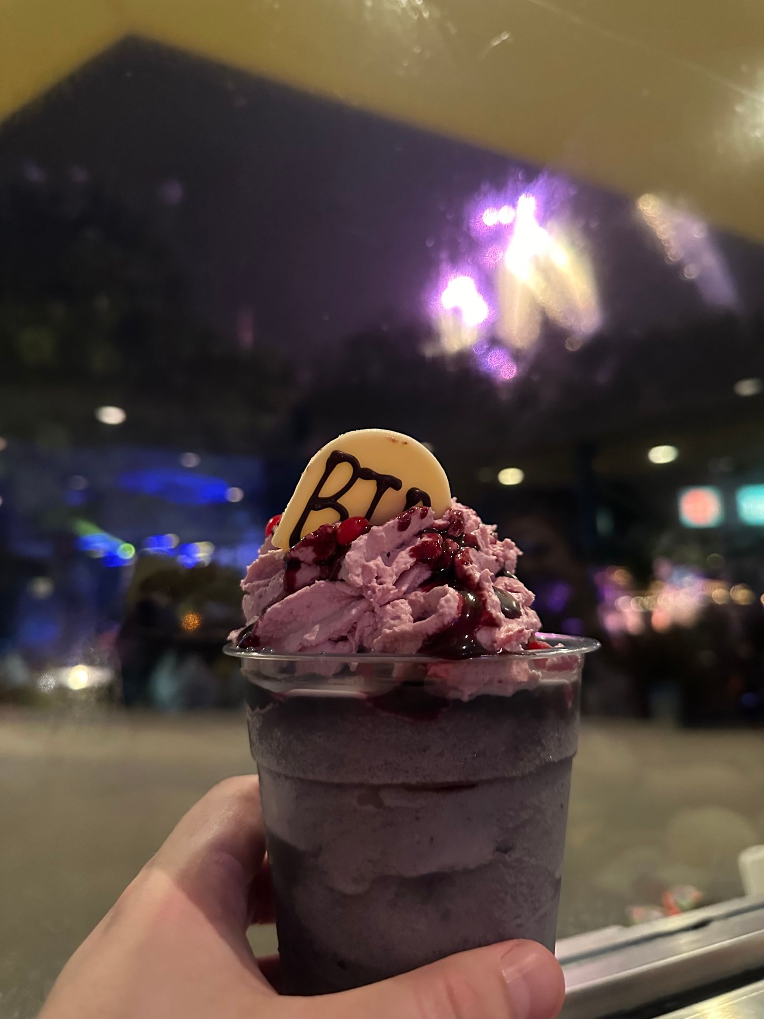 I’ve green tea slushie with fireworks in the background. This drink was awful. 