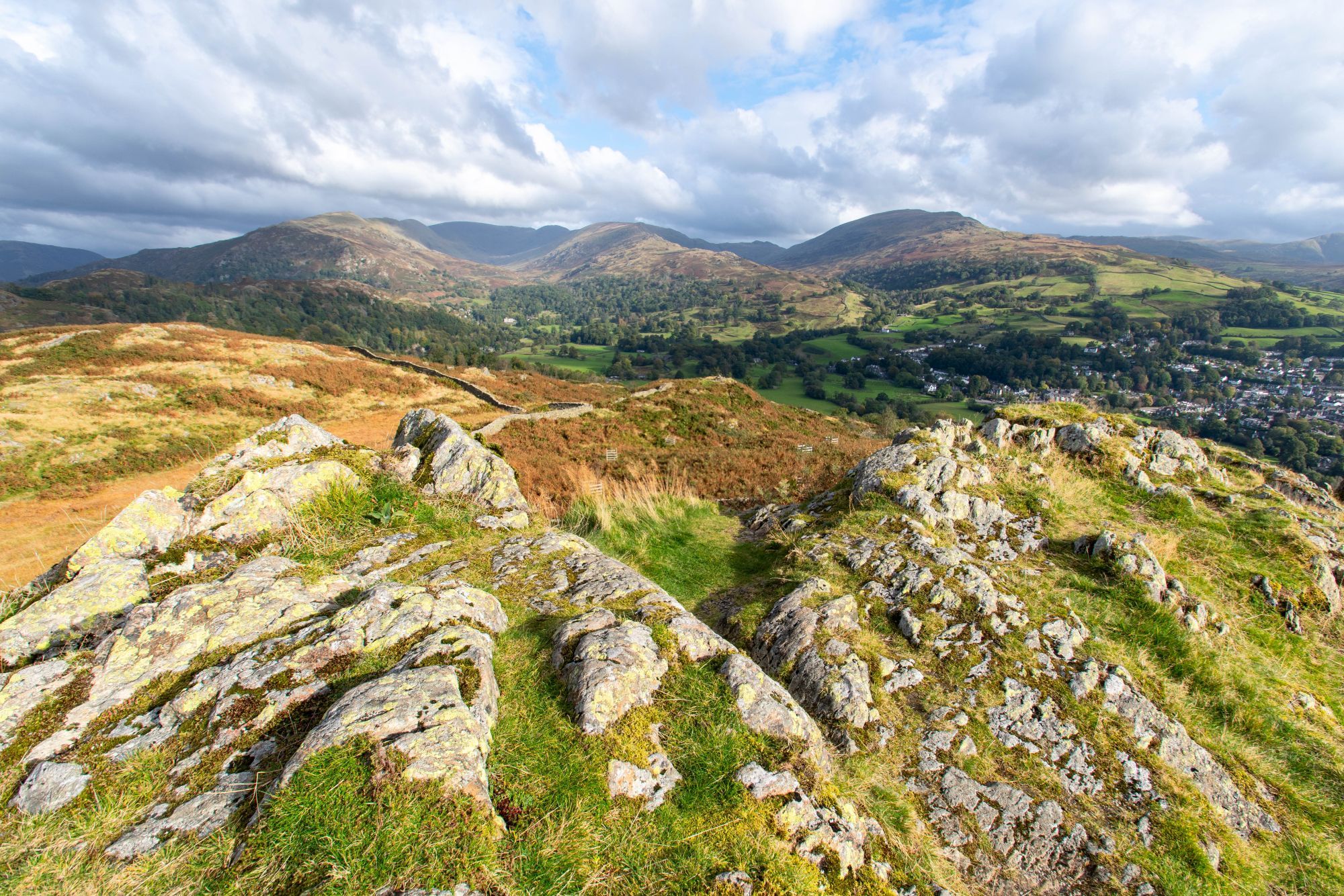 Mountain range with rocky crags in the foreground