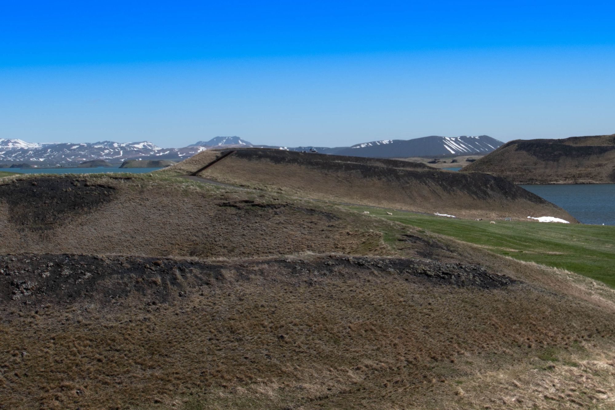 volcanic craters with lake and mountains