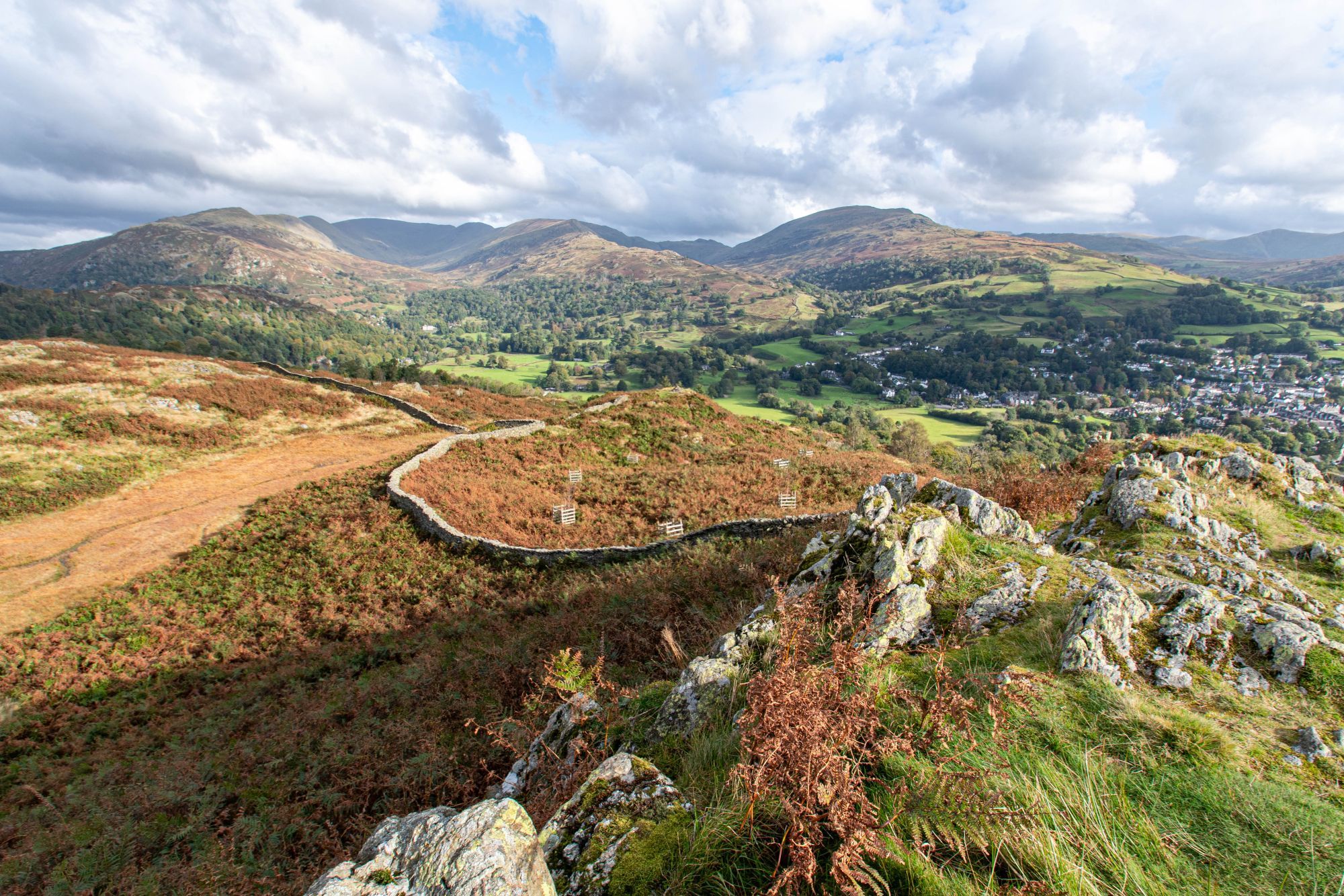 Mountain range with rocky crags in the foreground