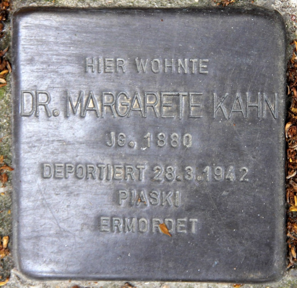 A photo of the Stumbling Stone Rudolstädter Straße 127, a “memorial stone (so called Stolperstein or stumbling block) [that] commemorates Margarete Kahn, murdered or disappeared in the Holocaust.

The small copper plaques, in the pavement in front of houses of which the (mostly Jewish) residents were murdered by the Nazis, mention the name, date of birth and place (mostly a concentration camp) and date of death.”