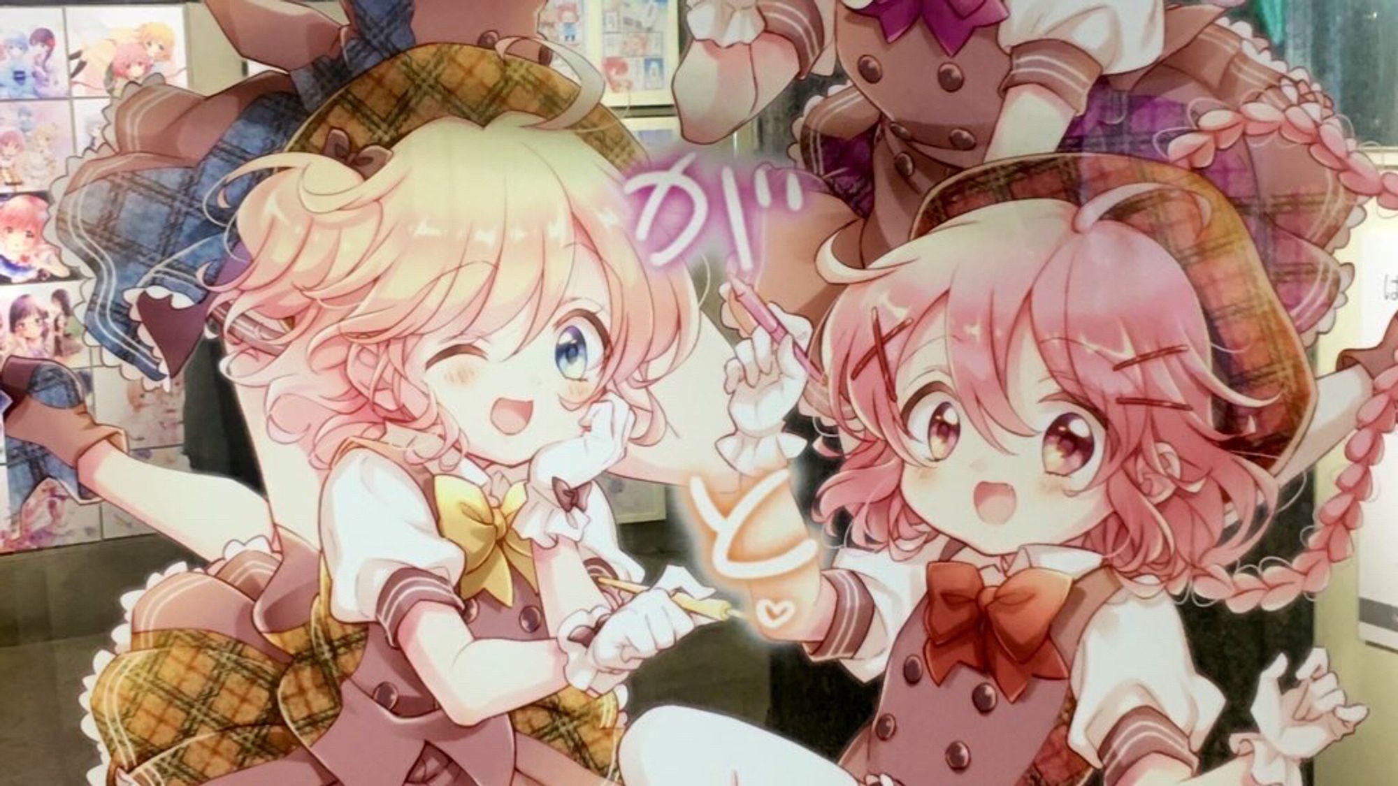 Kaoruko and Koyume illustrated on a transparent elastic sheet hung down from the ceiling