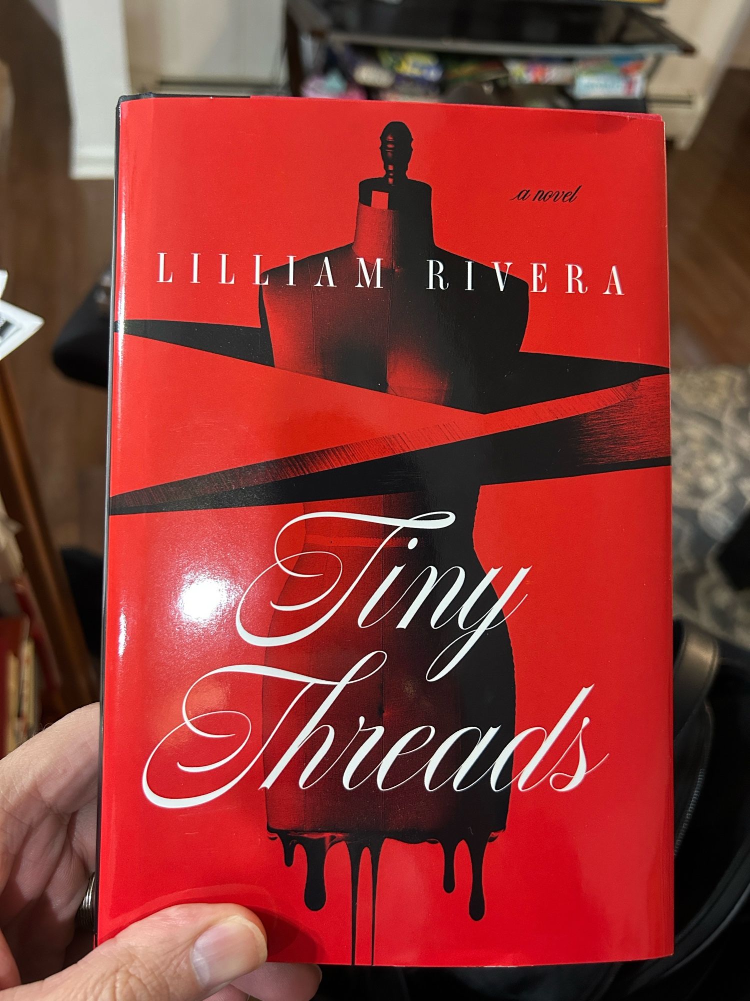 The cover of Lilliam Rivera’s “Tiny Threads”.