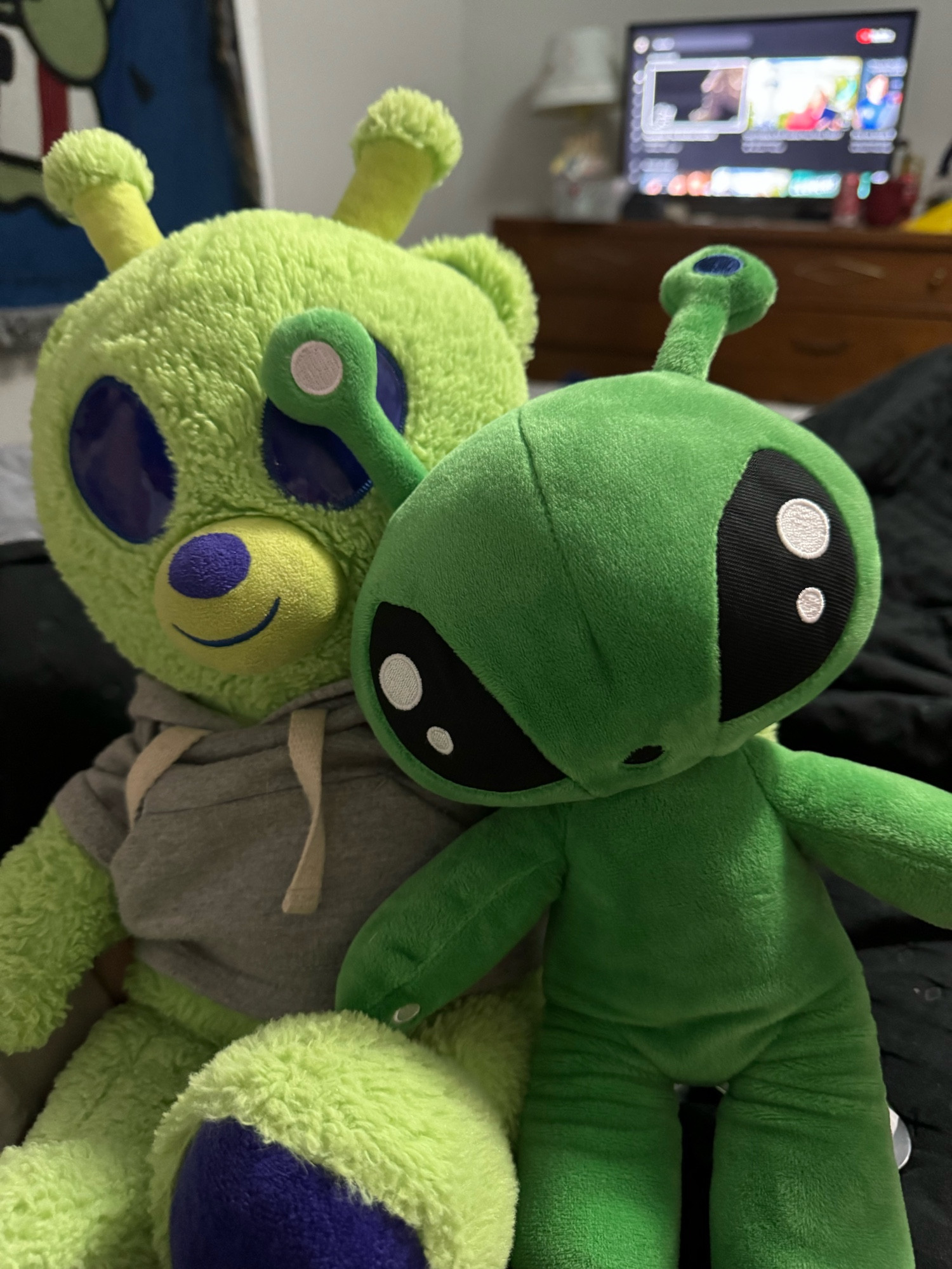 My two alien sons sitting in bed with us 