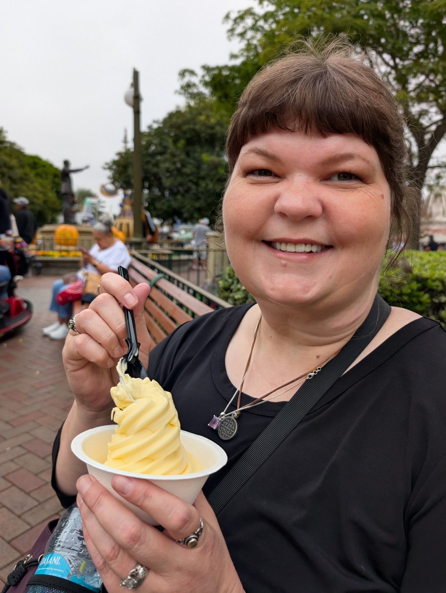 Jenn eating a Dole Whip 