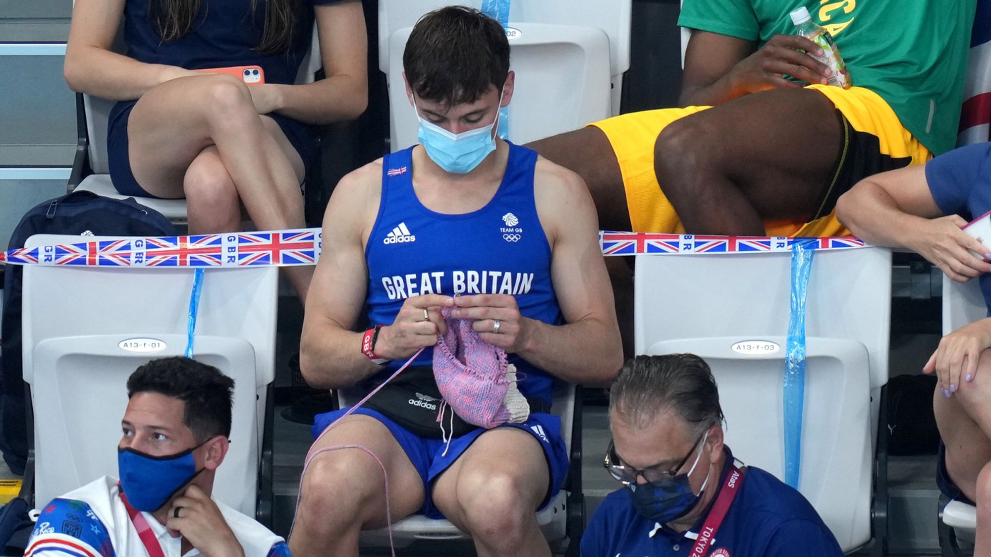 British diver Tom Daley knitting.